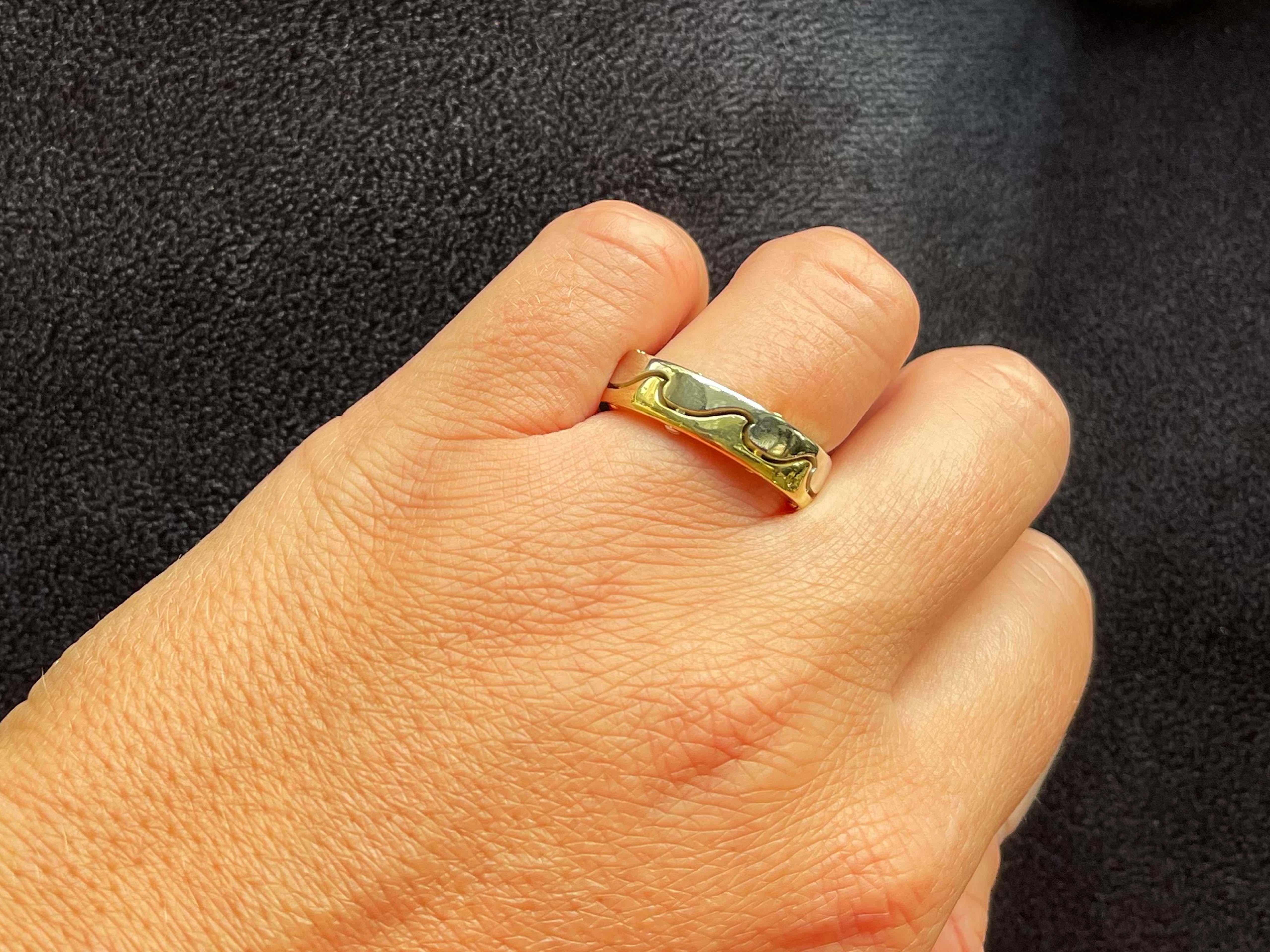 Item Specifications:

Metal: 18K Yellow and White Gold

Style: Statement Ring
​
​Ring Height: 6.47 mm

Ring Size: 9 (resizing available for a fee)

Total Weight: 12 Grams

Condition: Preowned, excellent

Stamped: 