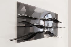Wave Wall Interactive wall sculpture in plexiglass by Raoul Gilioli