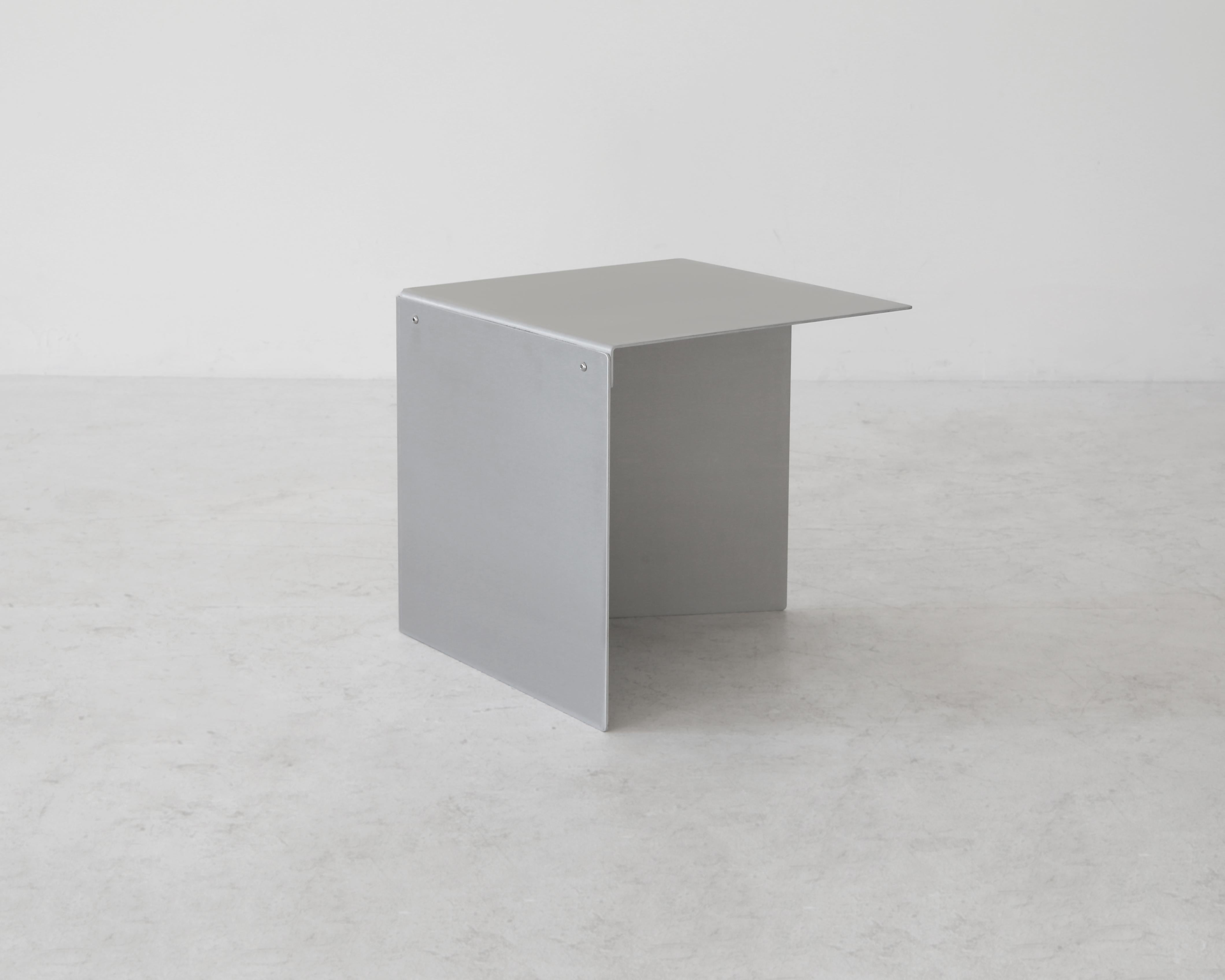 The Waverly Side Table is made of 3 pieces of bent aluminum, 1/8