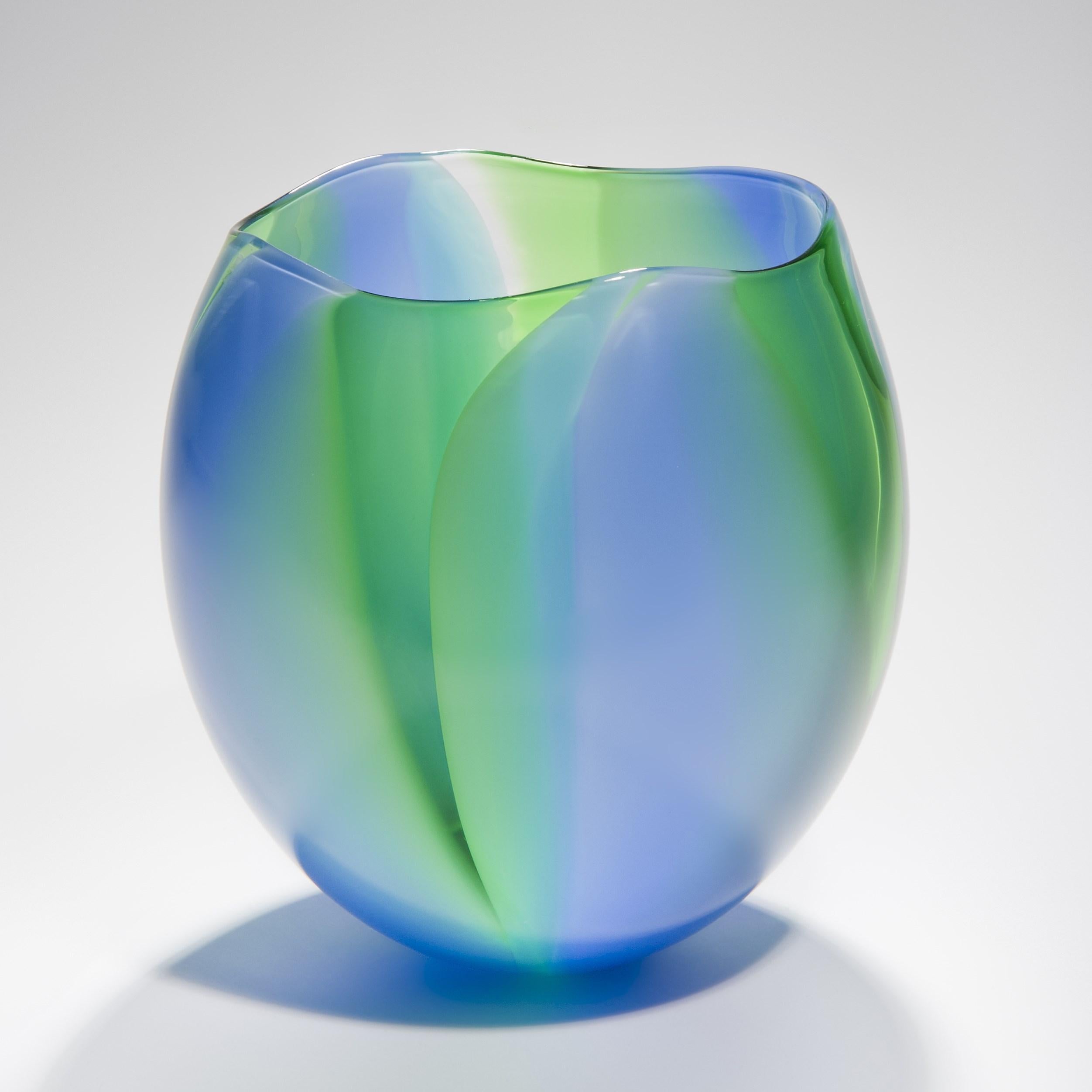'Waves in blue & green' is a beautifully crafted, handblown glass bowl by the British artist, Neil Wilkin.

'Waves' is a collection of beautifully crafted, unique glass bowls and centrepieces by the British artist Neil Wilkin. Taking a painterly