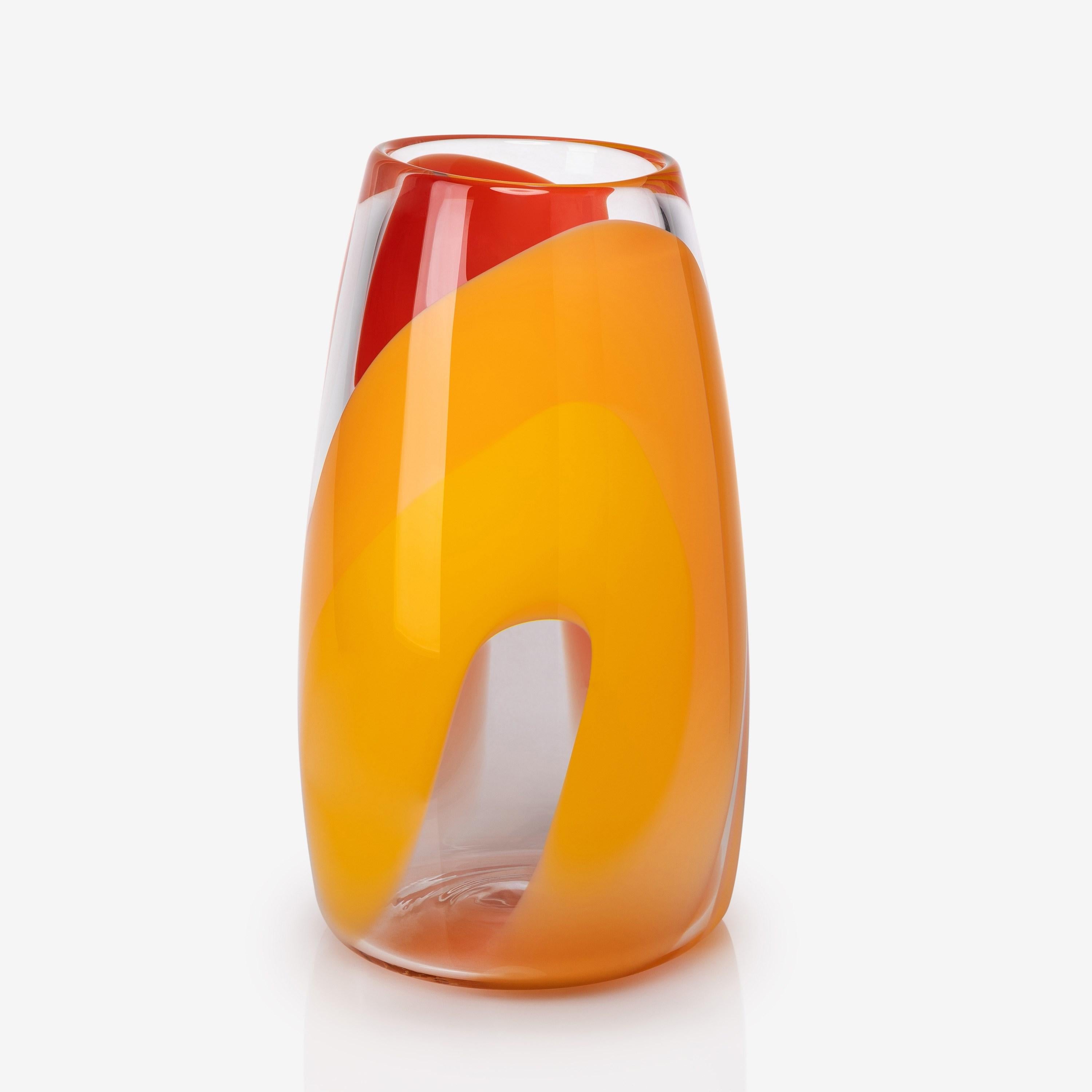 'Waves No 464' is a handblown glass vase by the British artist, Neil Wilkin.

'Waves' is a collection of beautifully crafted, unique glass bowls and centrepieces by the British artist Neil Wilkin. Taking a painterly approach, Neil Wilkin merges his