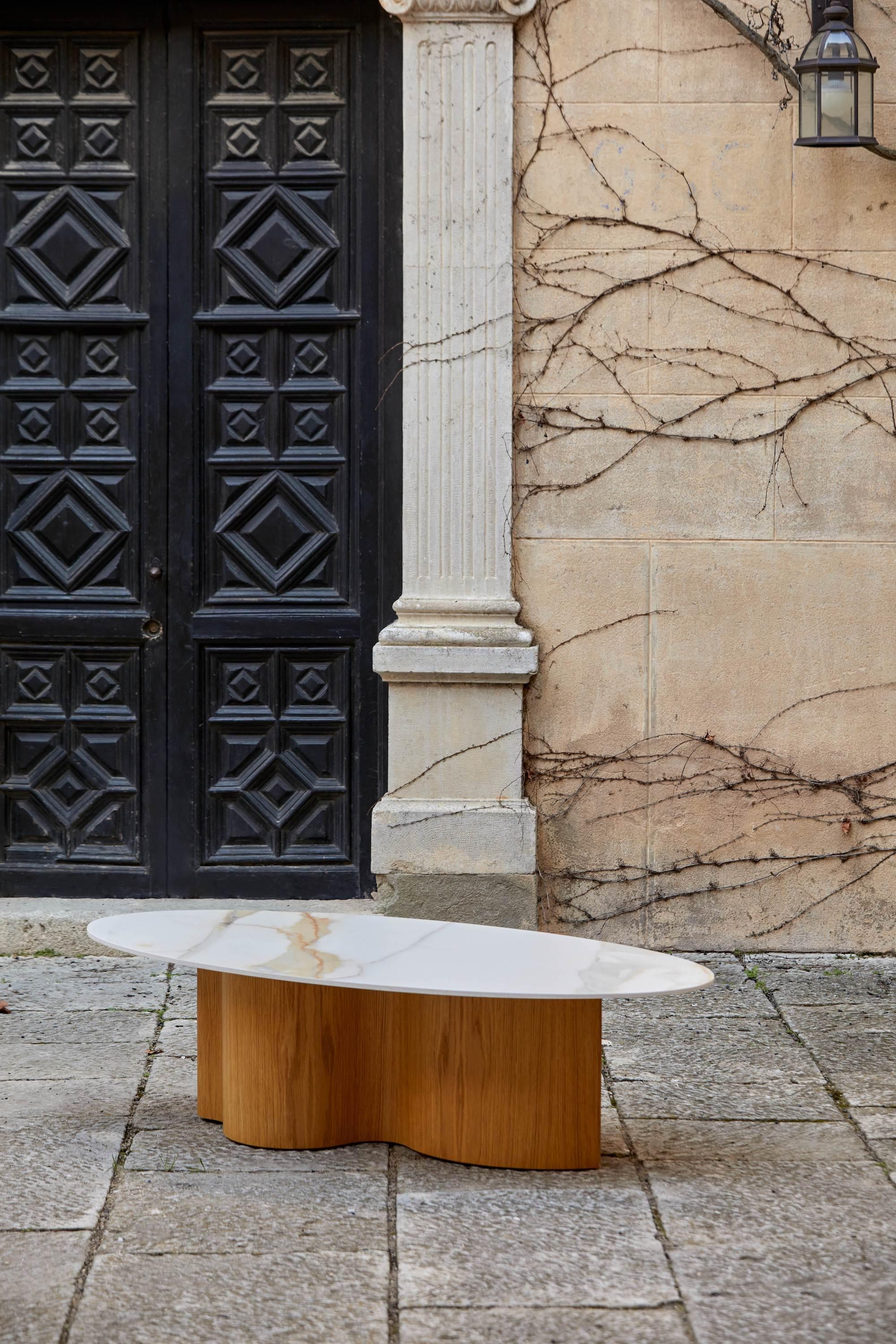 The WaveWoo Coffee Table is a masterpiece of design, echoing the graceful contours of our renowned WaveWoo dining table. This coffee table is crafted from 100% controlled wood with a rich Tobacco finish, bringing the beauty of nature's rhythms into