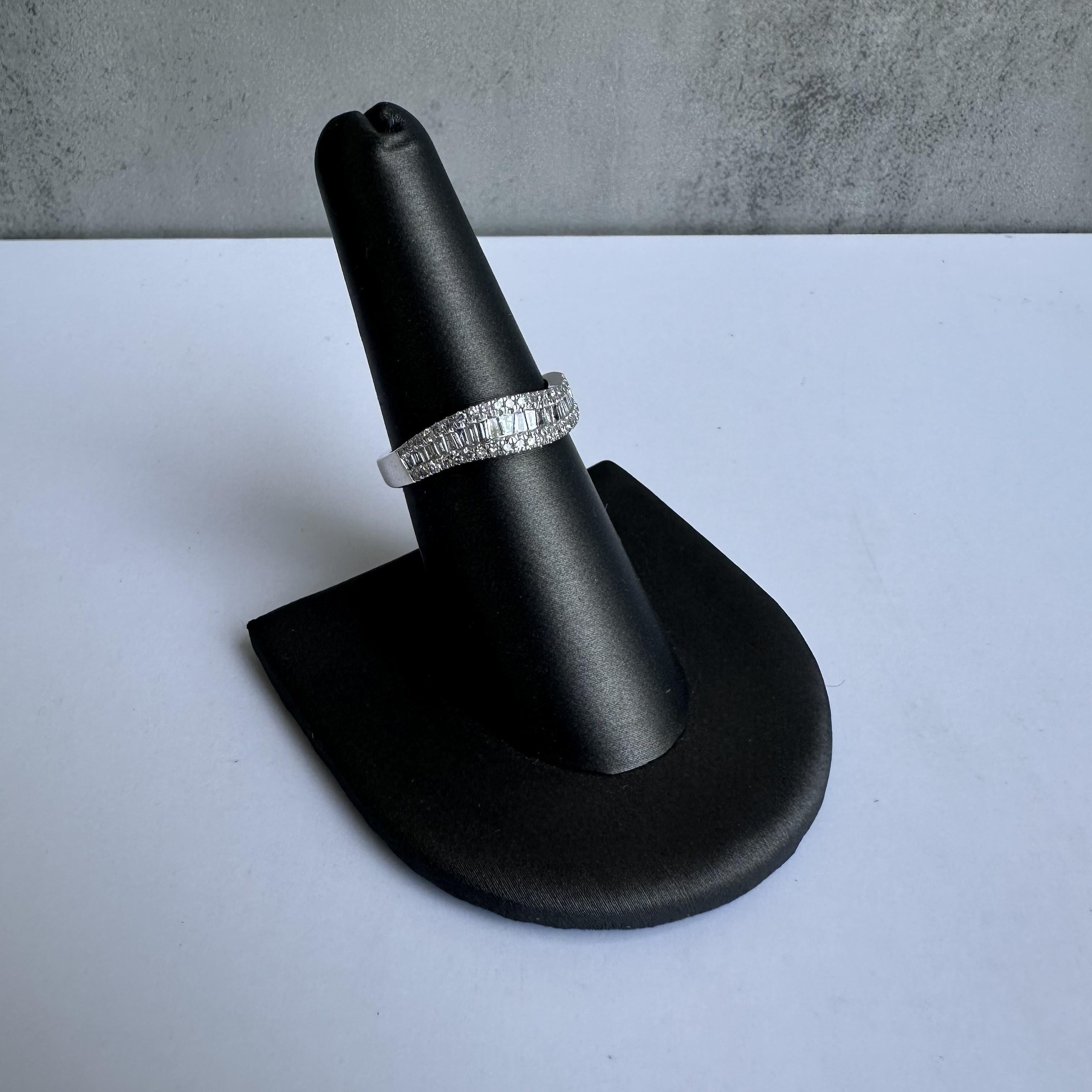 Enhance your jewelry collection with this exquisite Wavy Diamond Right Hand Statement Ring in 14kt White Gold. Featuring 0.50 carats of GH SI2-I1 eye clean natural round single cut and baguette cut diamonds, this ring combines timeless beauty with