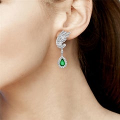Bird Shaped Earring with VS Diamonds & Pear Shaped Emerald in 18k White Gold