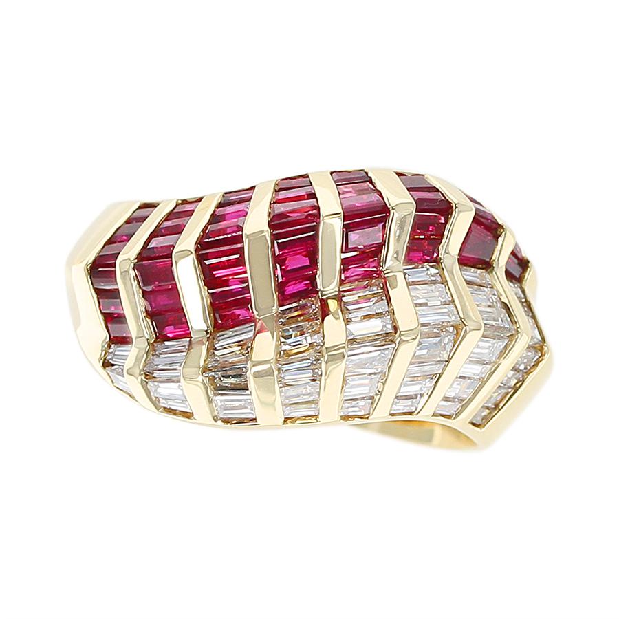 A Wavy Ruby and Diamond Baguette Ring in 18K Yellow Gold. Ruby Weight: 2.27 carats, Diamond Weight: 1.37 carats. Ring Size US 8.50. Total Weight: 10.79 grams.