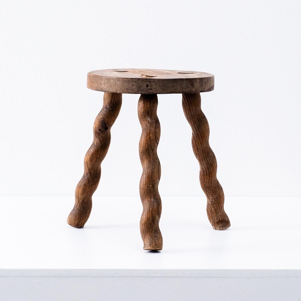 Rustic Wavy Wooden Legged Stool