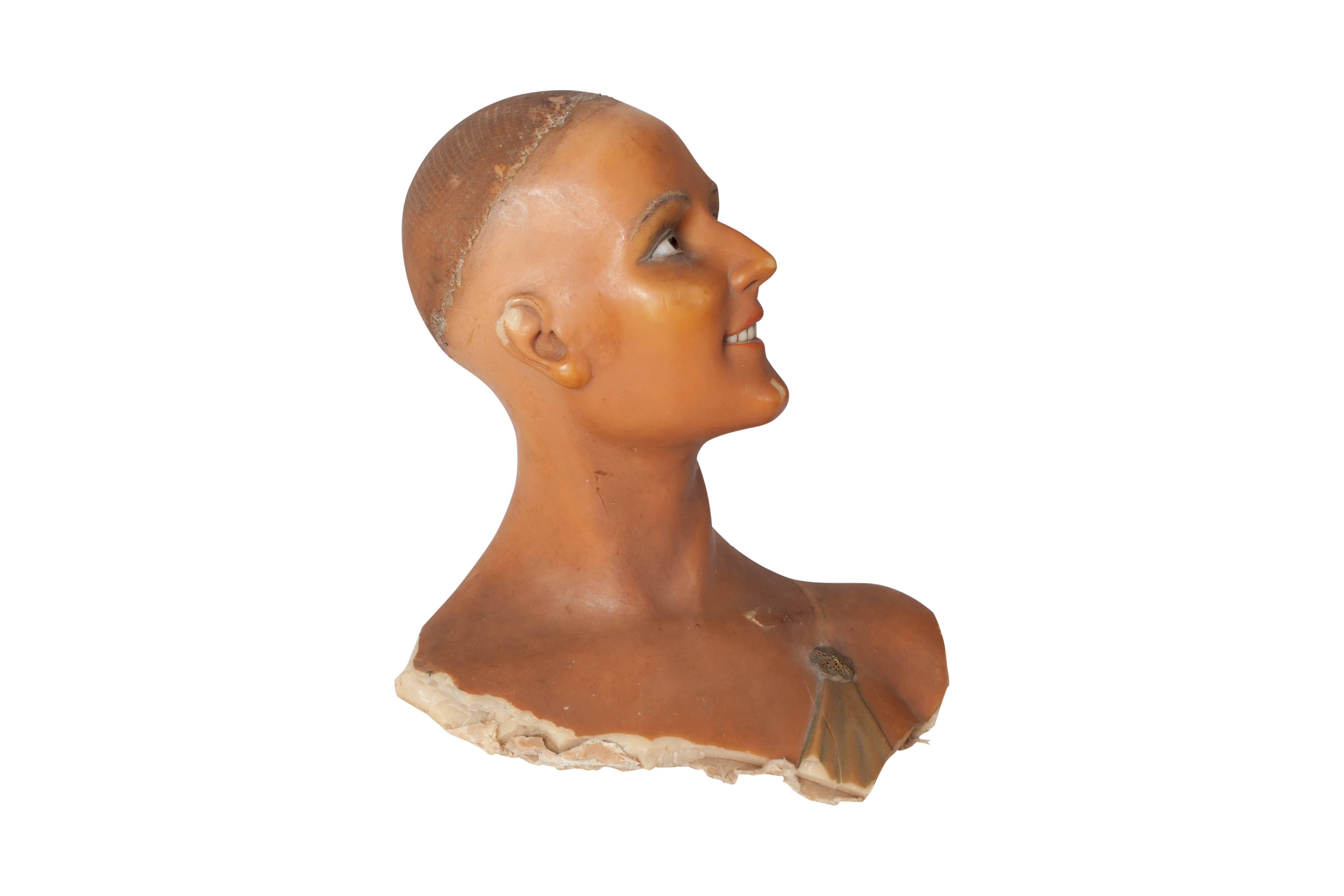 Intriguing woman’s bust sculpture made of wax, with glass eyes and prosthesis teeth.
Very nice and very decorative item! A wunderkammer piece.
    