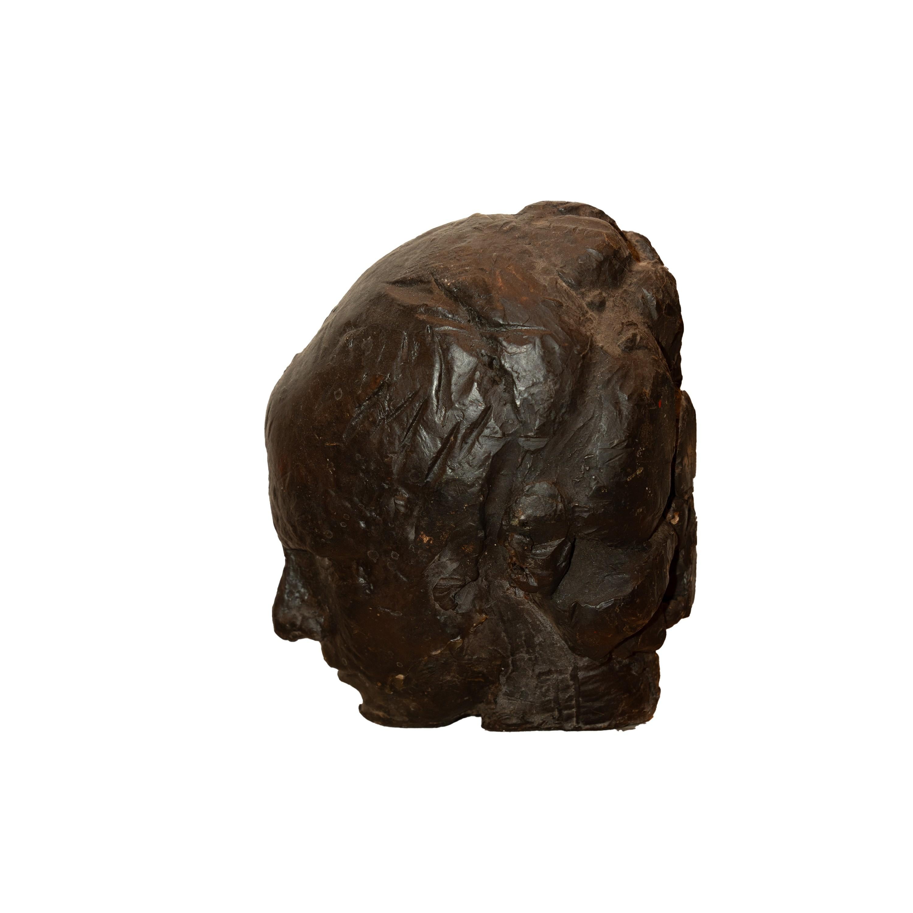 Artesanía única  escultura de un busto masculino utilizando cera como medio. 
Modernista estadounidense, artista desconocido. 