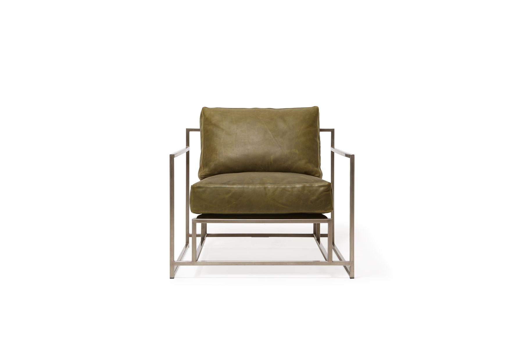 The Inheritance Armchair by Stephen Kenn is as comfortable as it is unique. The design features an exposed construction composed of three elements - a steel frame, plush upholstery, and supportive belts. The deep seating area is perfect for a