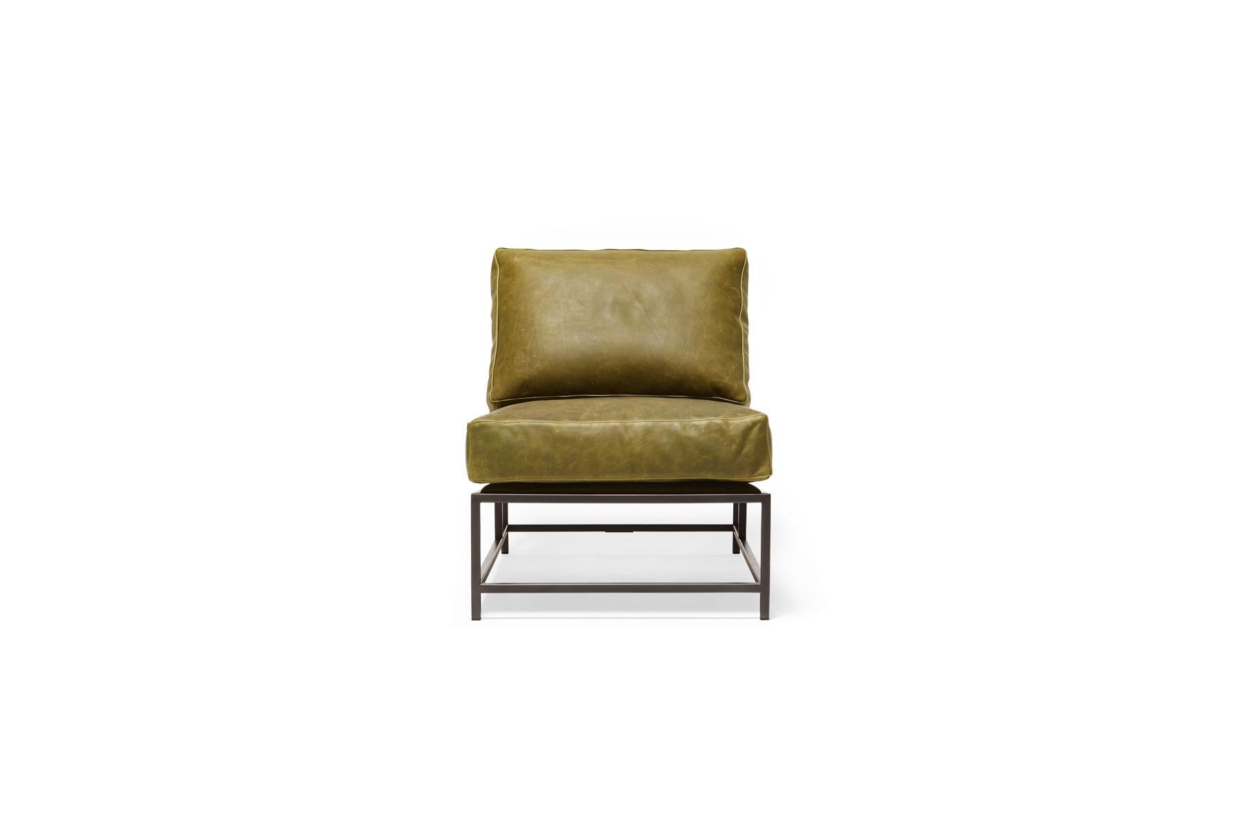 The Inheritance Armchair by Stephen Kenn is as comfortable as it is unique. The design features an exposed construction composed of three elements - a steel frame, plush upholstery, and supportive belts. The deep seating area is perfect for a