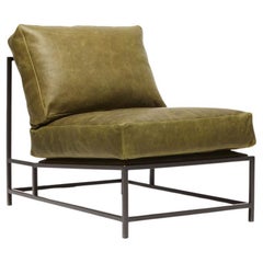 Silla de cuero verde musgo encerado y acero ennegrecido