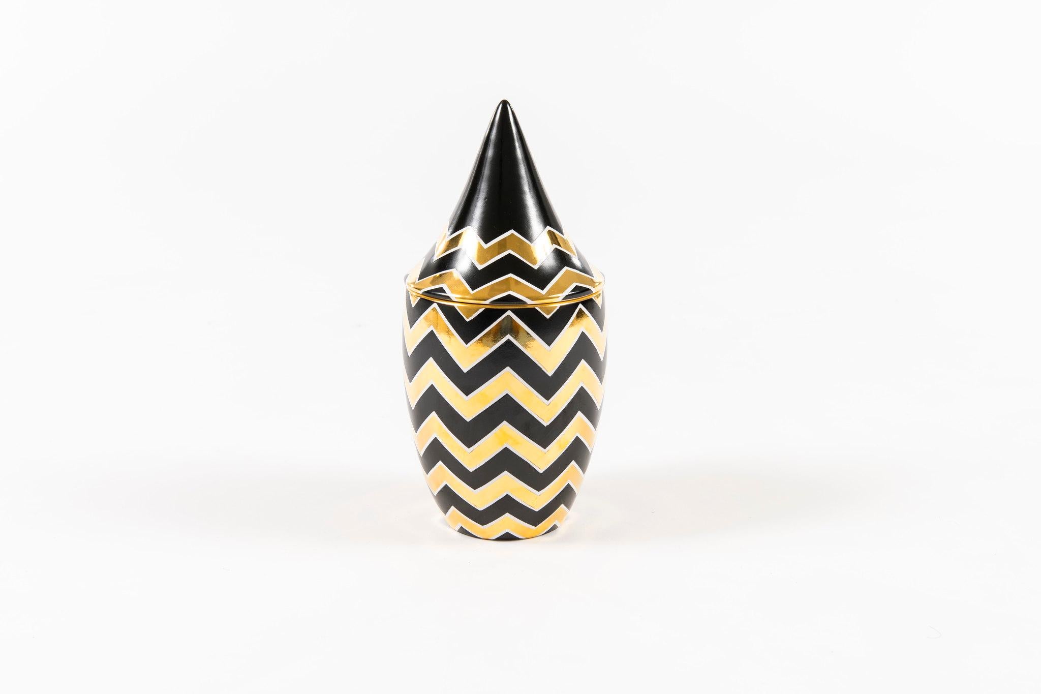 A decorative black and gold ceramic lidded jar. A lovely catchall jar and can double as a contemporary vase.

Waylande Gregory Studios was founded by Gregory’s great-grandnephew, Bryan Downey, and fashion entrepreneur Mickey Rosarin. The Studios