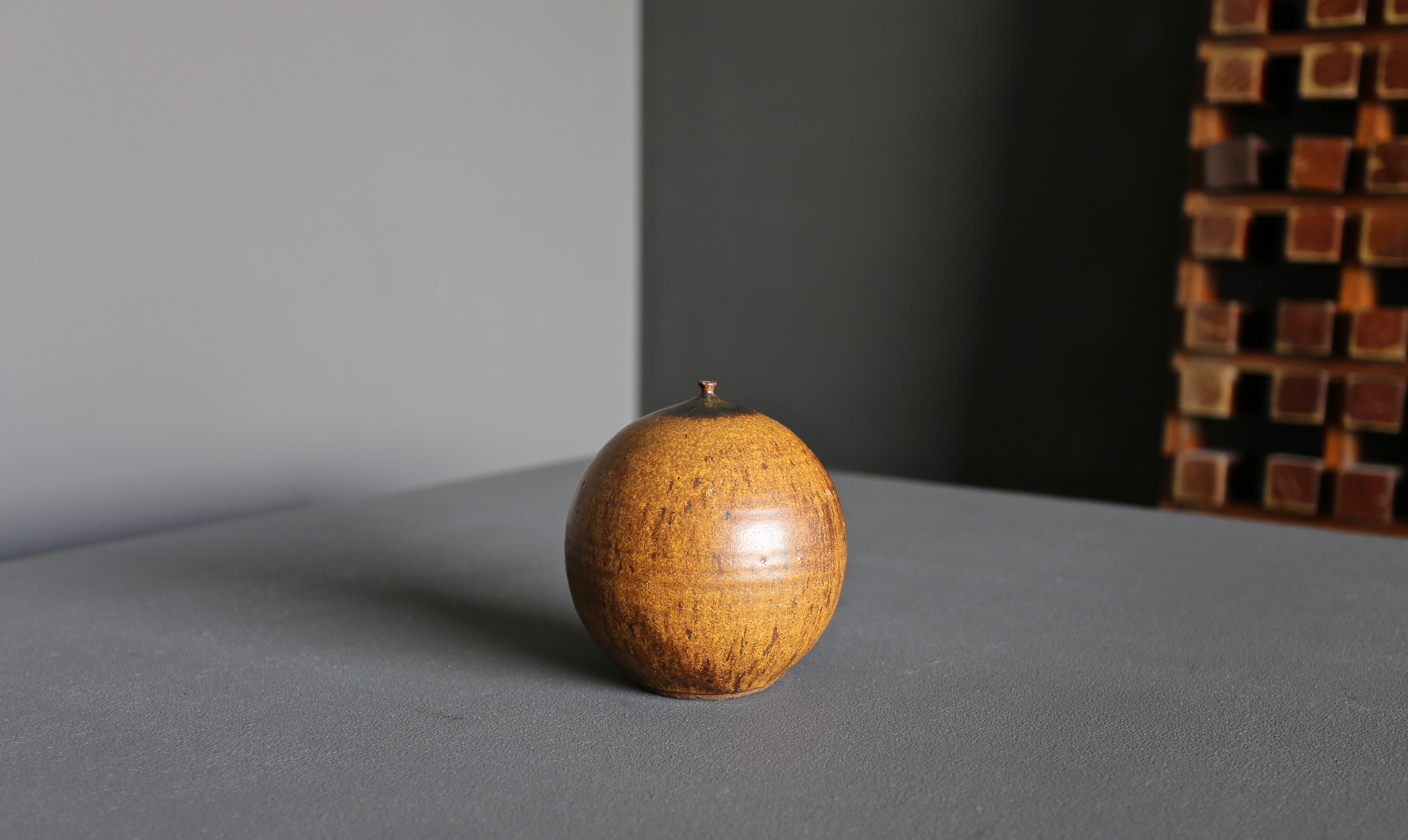 Wayne Chapman ceramic weed pot circa 1965. This piece is signed to the bottom.