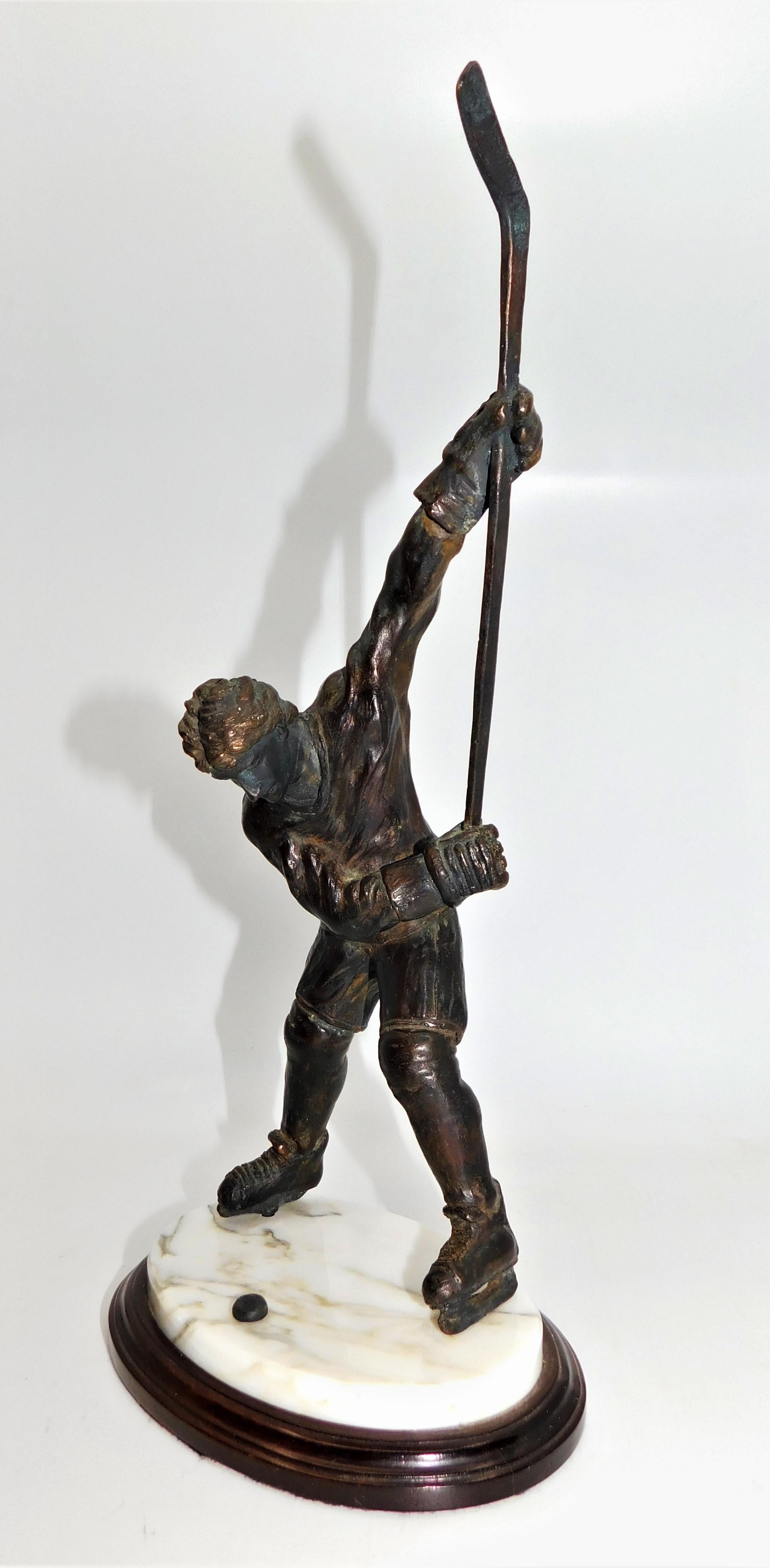 hand-sculpted bronze figures