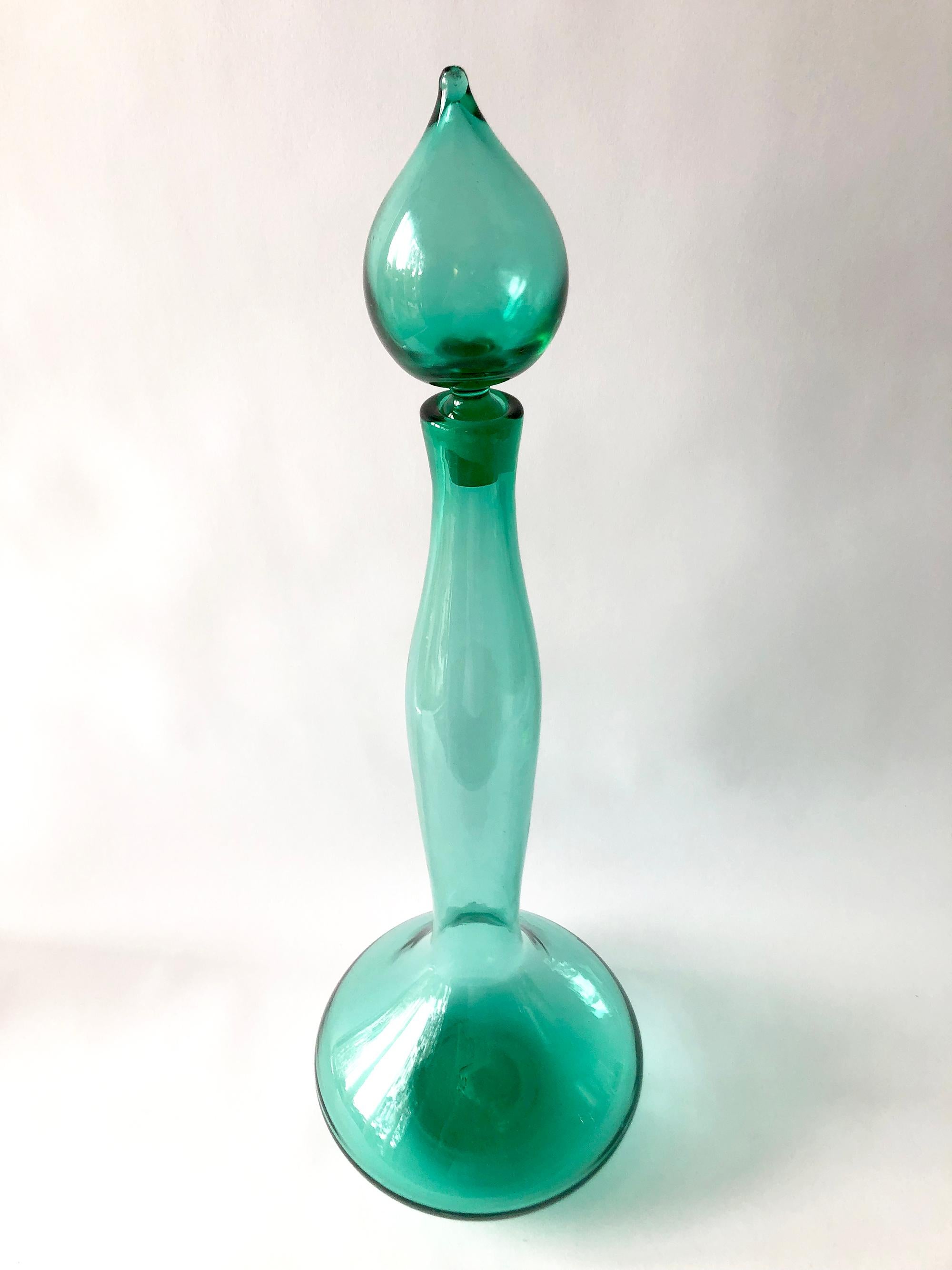 Sea foam green 5815L Genie bottle decanter designed in 1958 by Wayne Husted for Blenko. Decanter measures 25