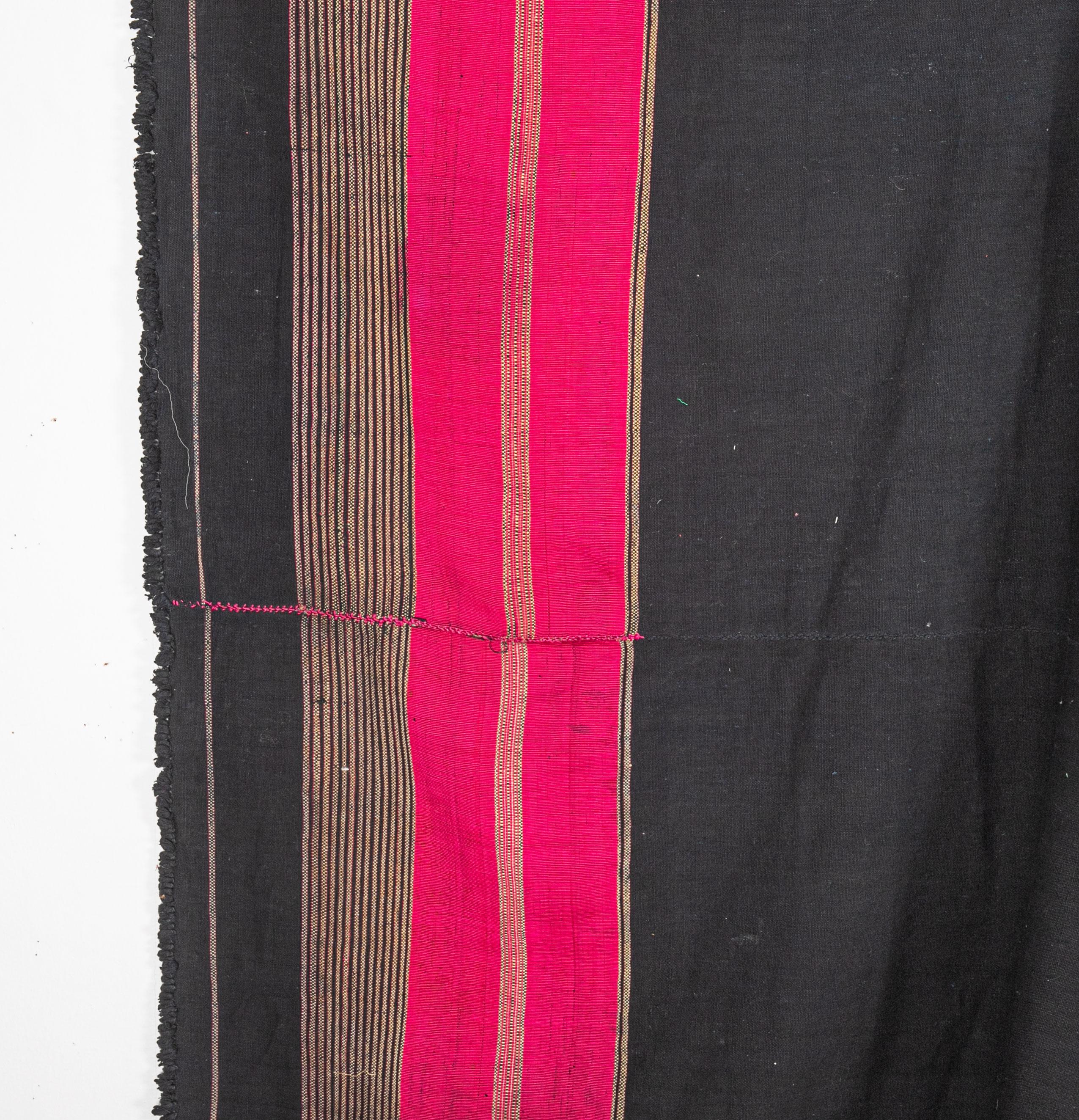 This is an indigo colored shawl in cotton and silk (pink sections are in silk).