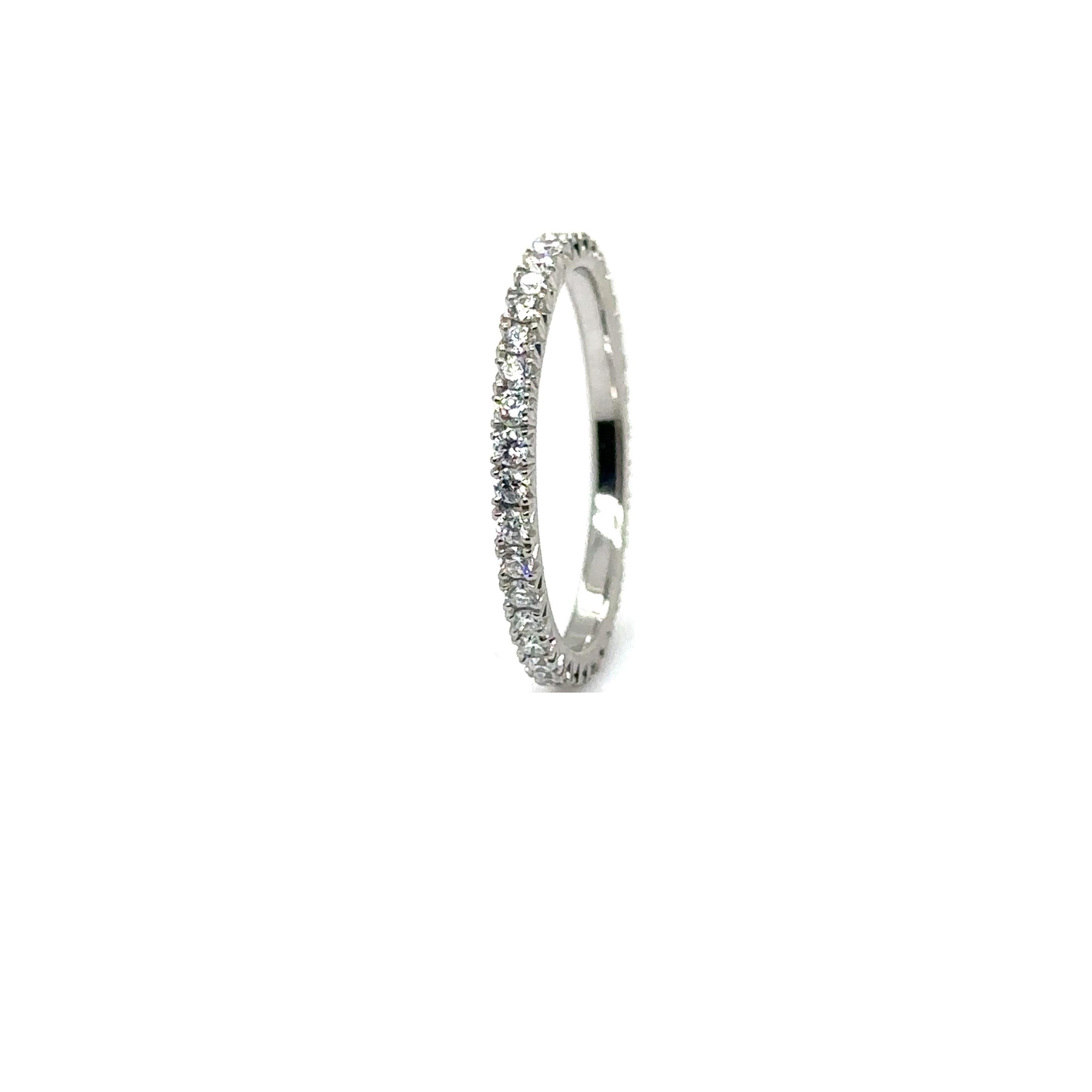 PLATINUM WEDDING BAND with 0.56 CWT DIAMONDS
Metal: Platinum
Diamond Info: 
33 - G/VS ROUND BRILLIANT DIAMONDS
SETTING MICRO PAVE FISH TAIL 
Total Ct Weight: 0.56 cwt.
Item Weight: 2.11 gm
Ring Size: 6 ¼ (Can be sized up to 6 ½)
Measurements:  1.80