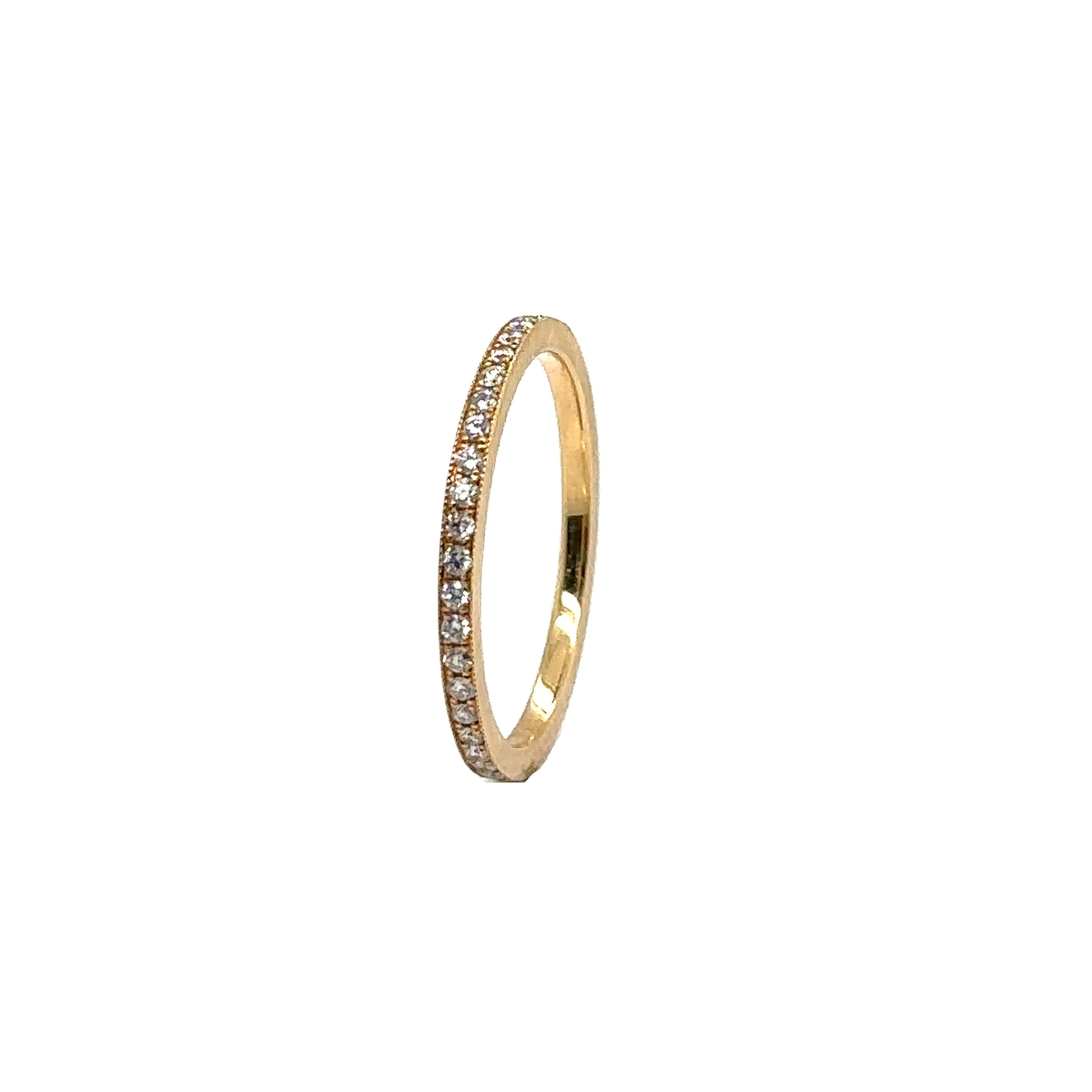 18K YELLOW GOLD WEDDING BAND with DIAMONDS
Metal: 18K Yellow Gold
Diamond Info: 
43 - G/VS ROUND BRILLIANT DIAMONDS
SETTING MICRO PAVE BRIGHT CUT WITH MILLI GRAIN 
Total Ct Weight:  0.33 cwt.
Item Weight: 1.59 gm
Ring Size: 6 ¼ plus (Can be sized up