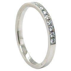 WB-17-PLAT - PLATINUM WEDDING BAND with 0.26 CT HALF WAY AROUND DIAMONDS