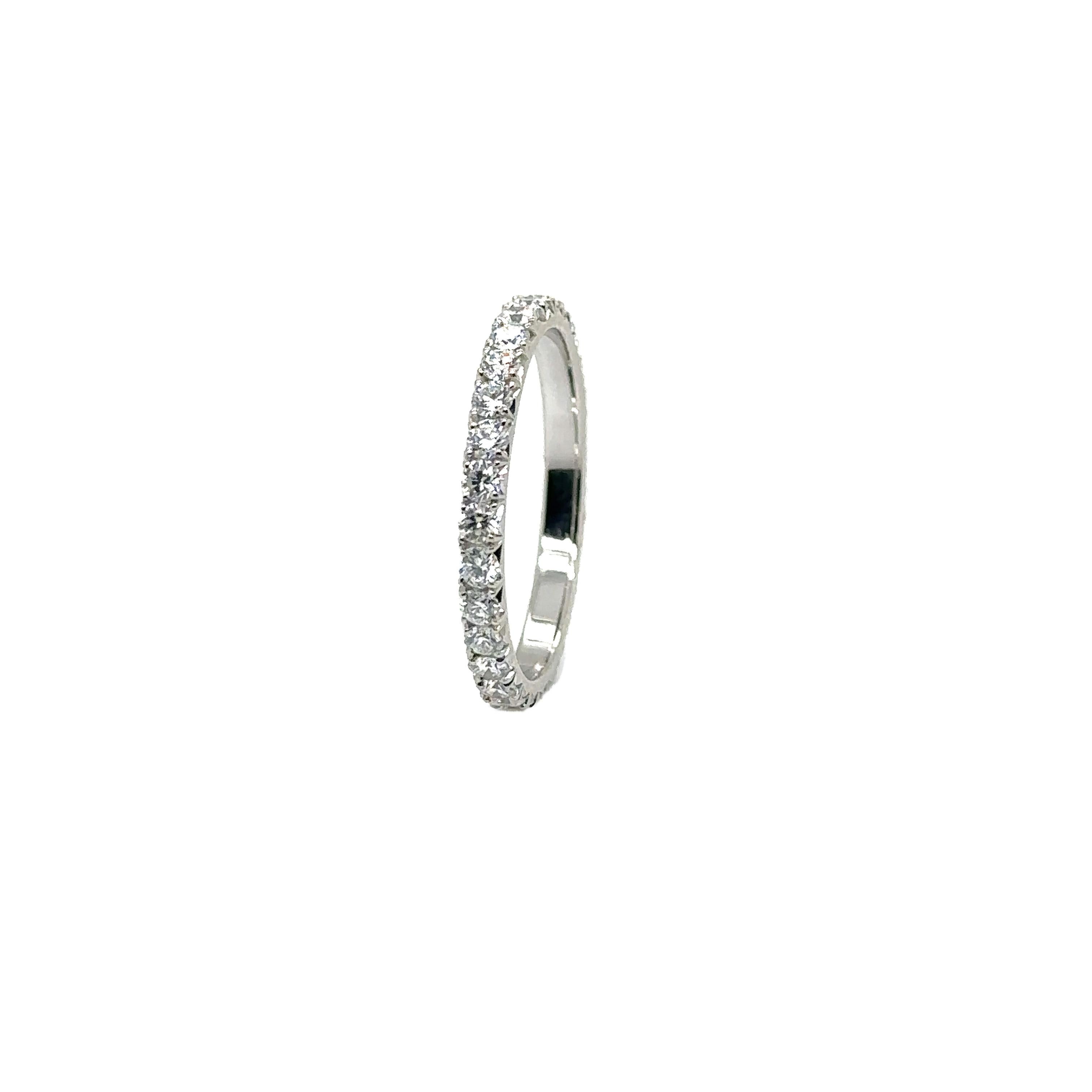 PLATINUM MICRO PAVE FISH TAIL BAND with 0.83 CWT DIAMONDS
Metal: PLATINUM
Diamond Info: 30 - G/VS ROUND BRILLIANT DIAMONDS 
Total Ct Weight: 0.83 cwt.
Item Weight:  2.08 gm
Ring Size: 6 ¼ (Can be sized up to 6 ½)
Measurements:  2.10 mm width
