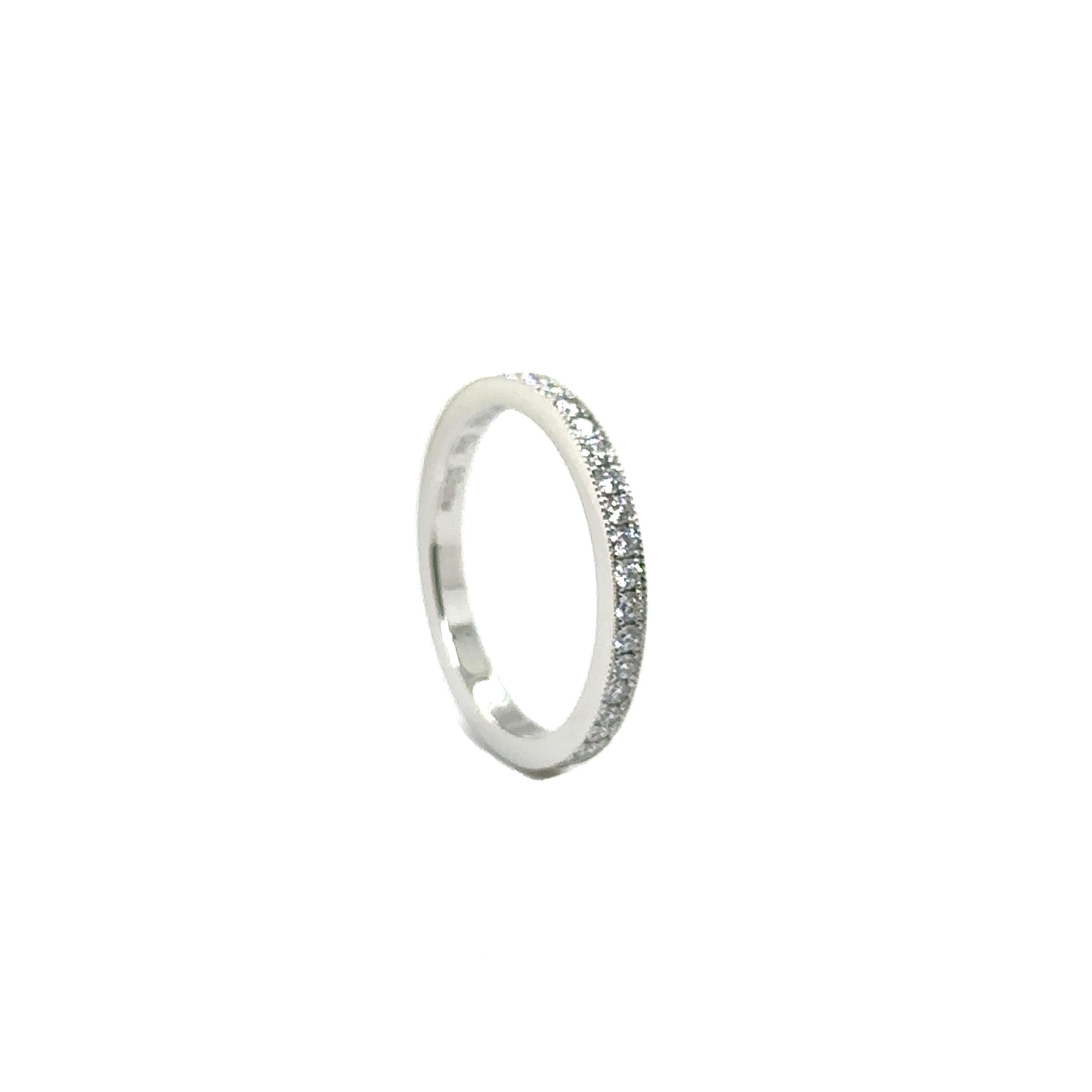 PLATINUM WEDDING BAND with 0.52 CT DIAMONDS
Metal: Platinum
Diamond Info: 
39 - G/VS ROUND BRILLIANT DIAMONDS
SETTING MICRO PAVE BRIGHT CUT WITH MILLI GRAIN
Total Ct Weight:  0.52 cwt.
Item Weight: 3.33 gm
Ring Size:  6 1/4  (Can be sized up to 6