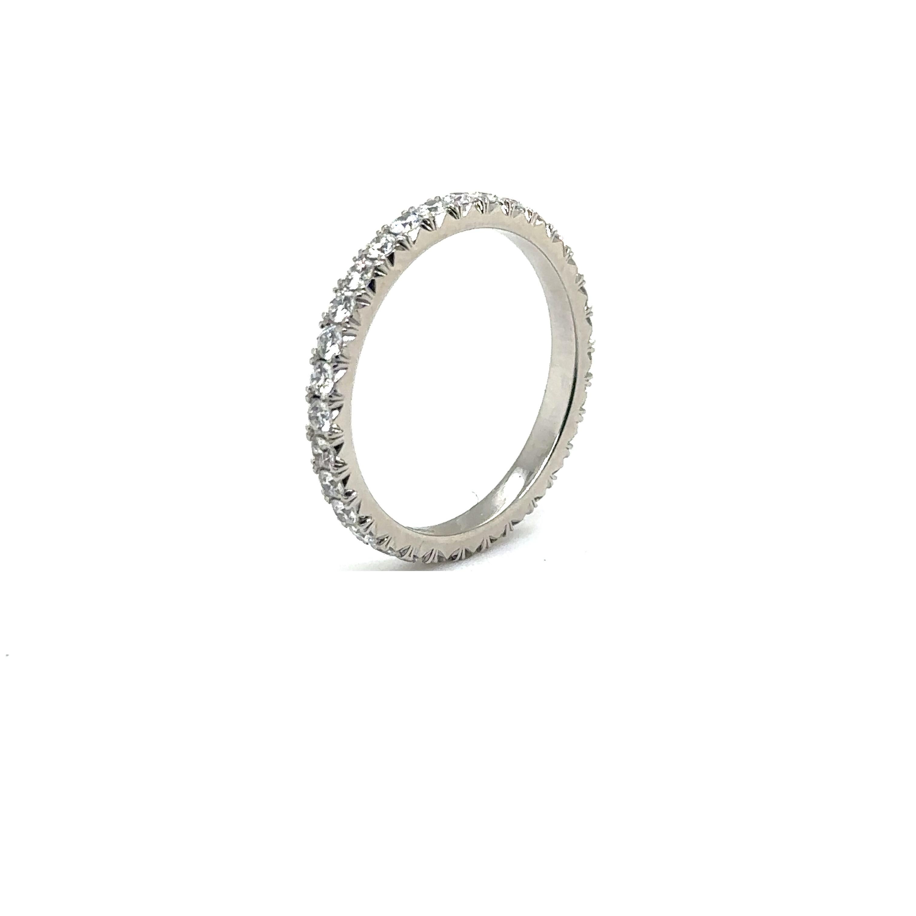 PLATINUM WEDDING BAND with 0.68 CWT DIAMONDS
Metal: Platinum
Diamond Info: 
31 - G/VS ROUND BRILLIANT DIAMONDS
SETTING MICRO PAVE FISH TAIL
Total Ct Weight:  0.68 cwt.
Item Weight: 3.06 gm
Ring Size: 6 ¼ (Can be sized up to 6 ½)
Measurements: 2.25