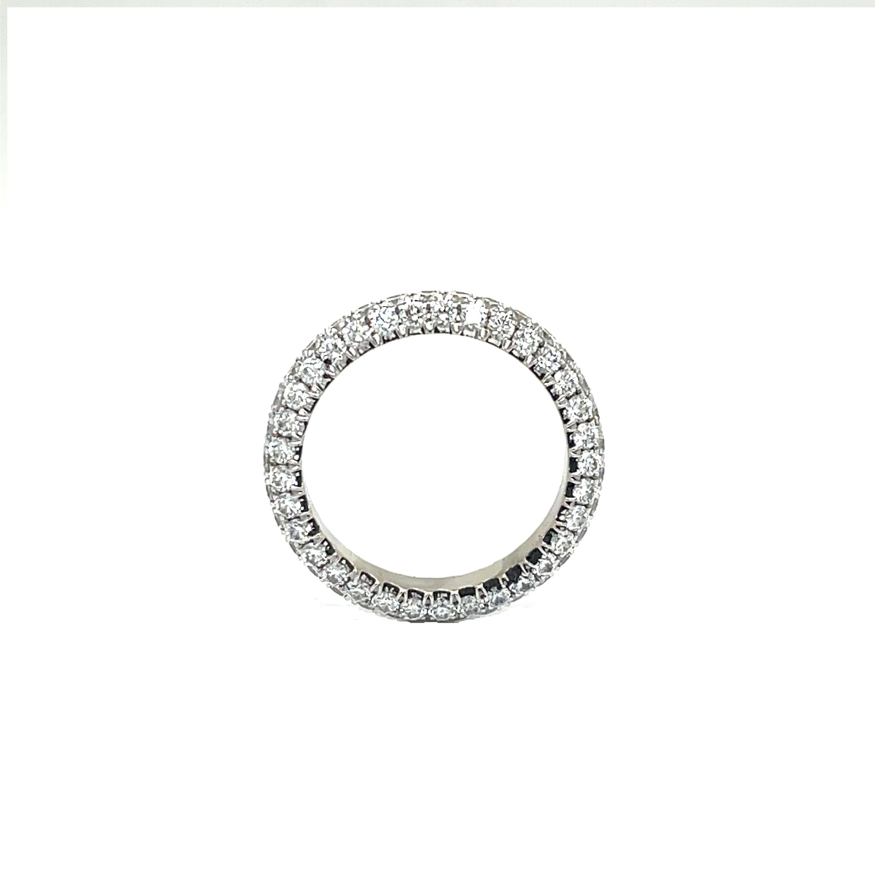 18KW 3 ROW WEDDING BAND WITH DIAMONDS
Metal: 18K White Gold
Diamond Info: G SI, 99 Round Brilliant Diamonds 
Total Diamond Weight: 2.23 cwt.
Item Weight:  3.58 gm 
Ring Size:   6 (Not re-sizable)
Measurements:  3.65 mm Width
*** All products from