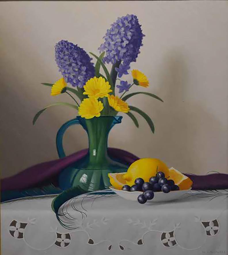 This floral still life, "Flowers & Feathers", by artist W.C. Nowell is a 19x17 oil painting on canvas featuring a tall blue glass pitcher of purple lavender and yellow flowers. The vase is draped with a purple cloth and surrounded on a table by blue