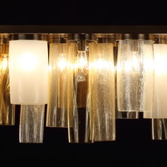 WD077 – Artistics, CUSTOM MADE Lampe „Skyline“ mit gemischten bernsteinfarbenen Glasröhren von Multiforme