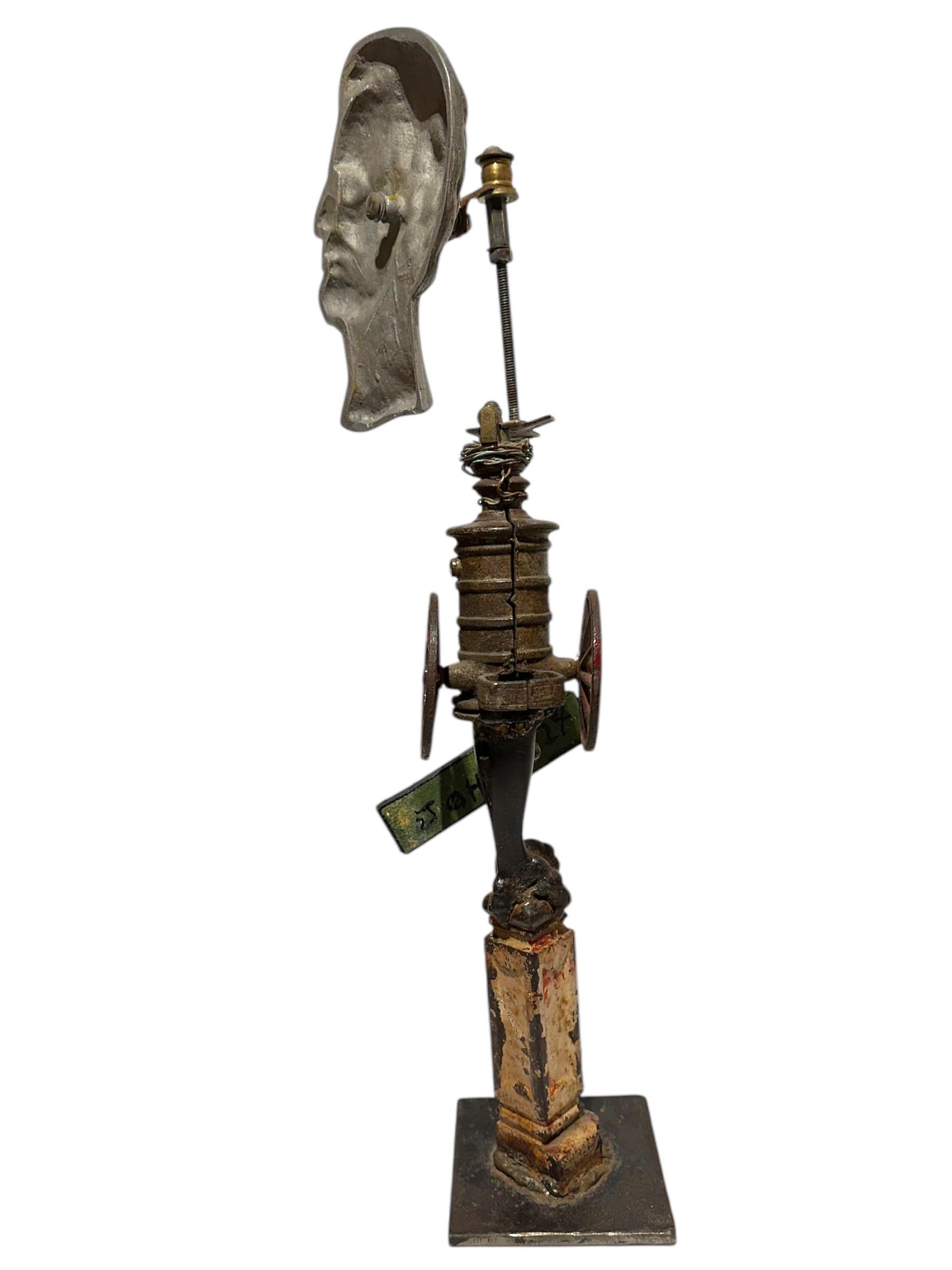 Self-taught artist John Seubert, AKA John Dolly, John John, and John Gray, uses found and collected objects and ephemera, some of which he uncovers as he rehabs older homes in Chicago. His works cycle through series of paintings, sculptural