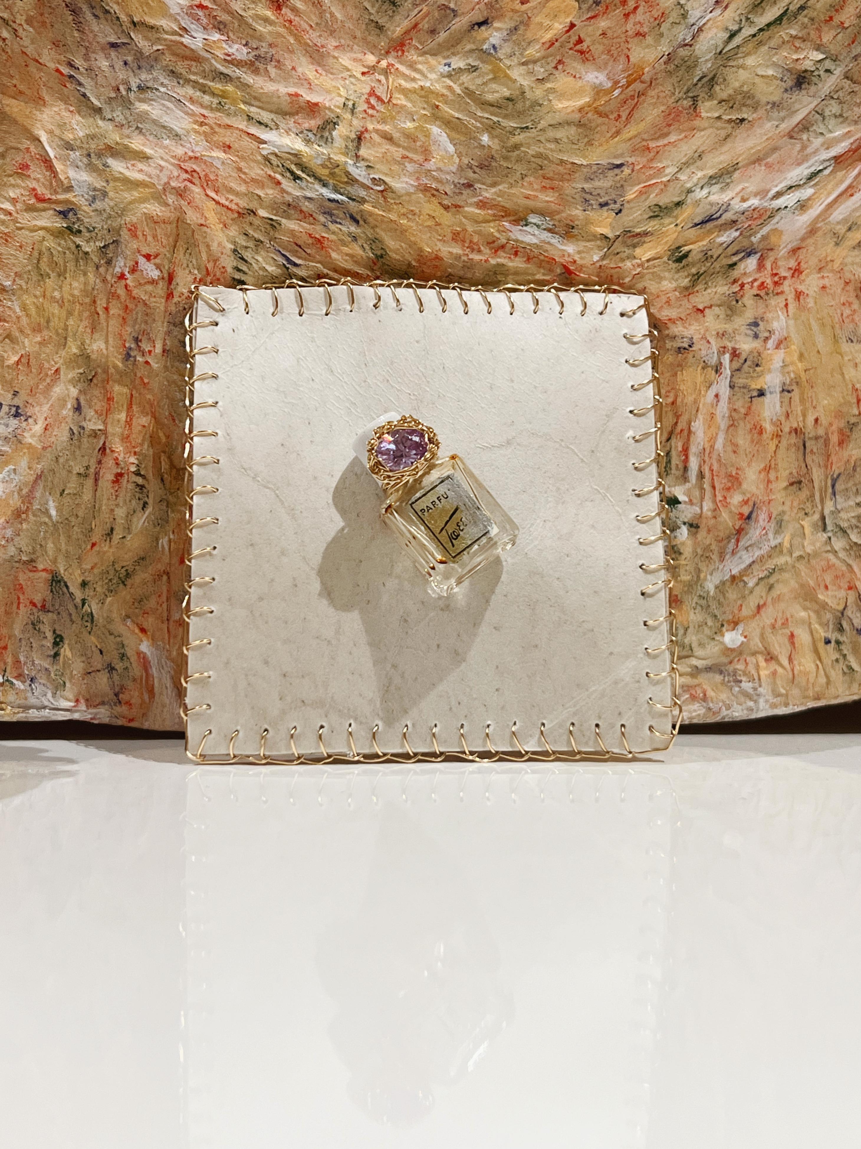 Women's or Men's Wearable Art Brooch, vintage perfume bottle on deer parchment, by the artist For Sale