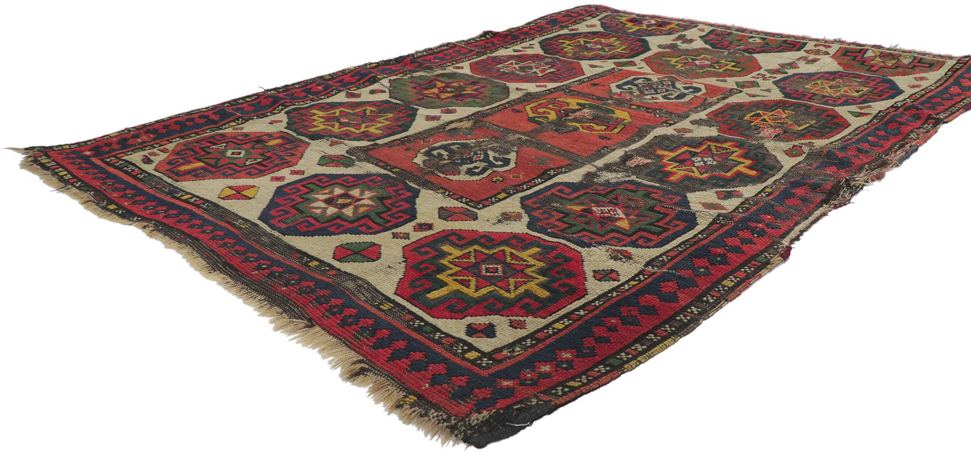 78211 Weathered Antique Caucasian Kazak distressed rug with Tribal style, 04'00 x 05'10. Full of tiny details and tribal style, this hand-knotted wool distressed antique Caucasian Kazak rug is a captivating vision of woven beauty. The weathered