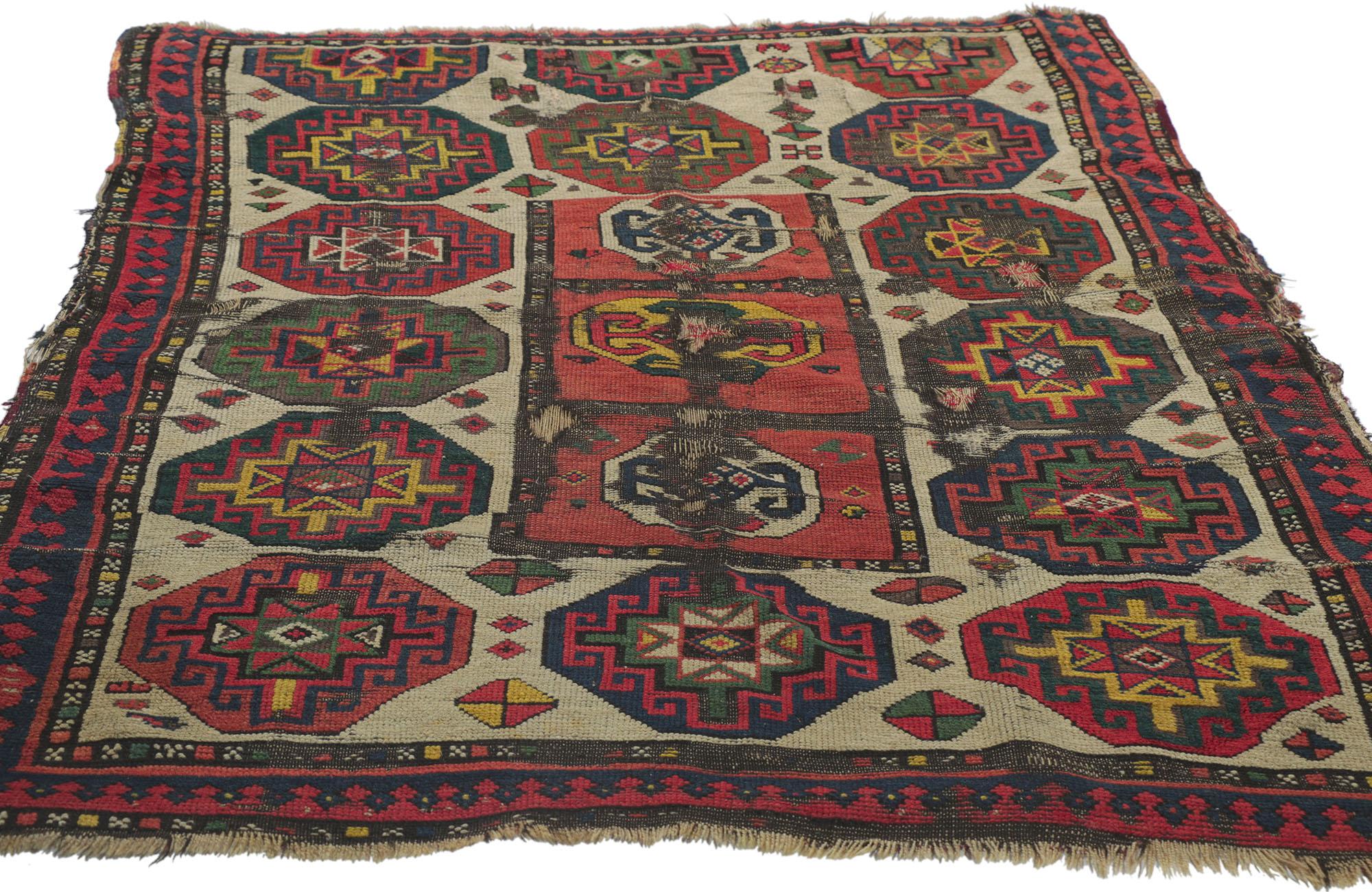 Hand-Knotted Weathered Antique Caucasian Kazak Distressed Rug with Tribal Style For Sale