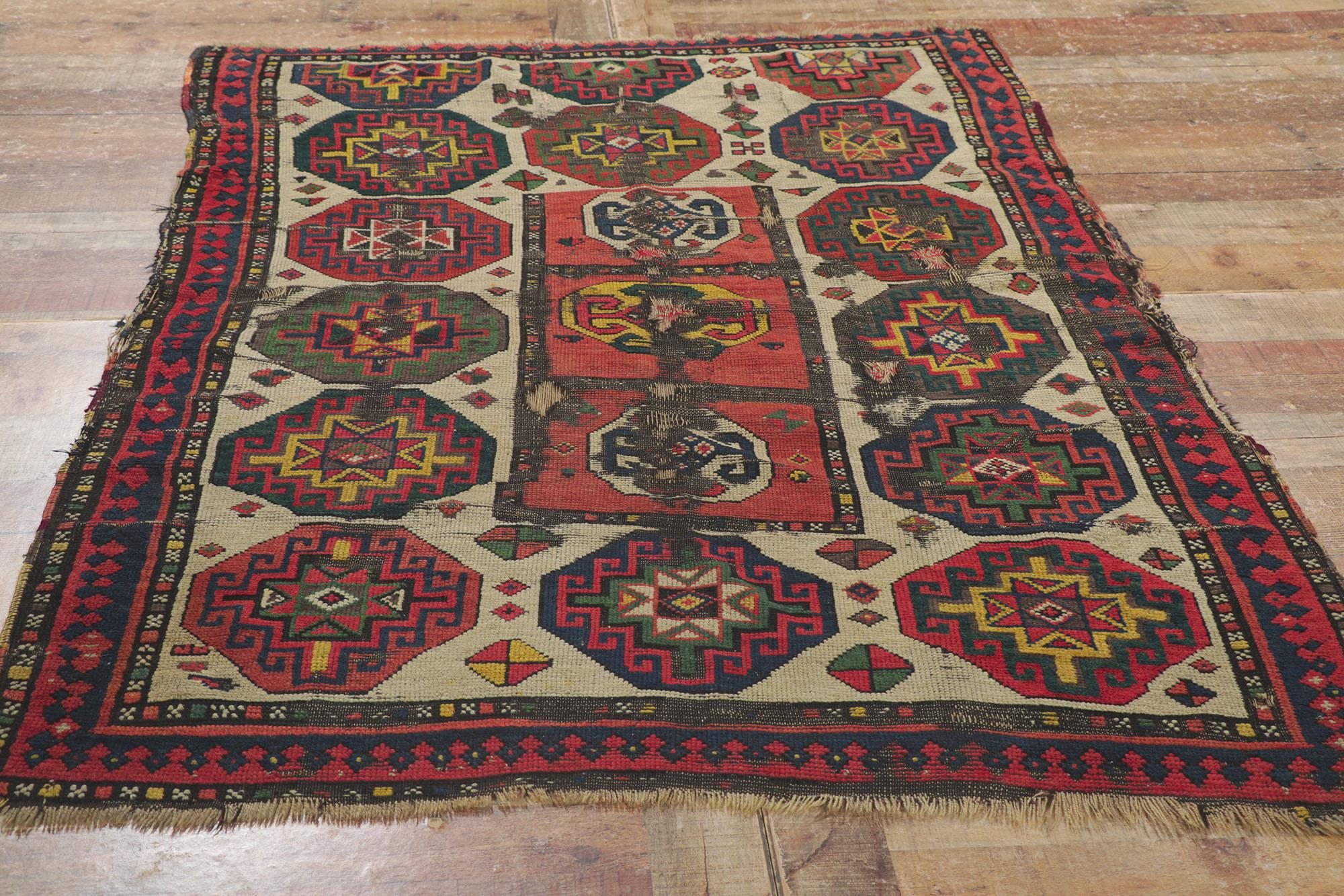 Weathered Antique Caucasian Kazak Distressed Rug with Tribal Style For Sale 1
