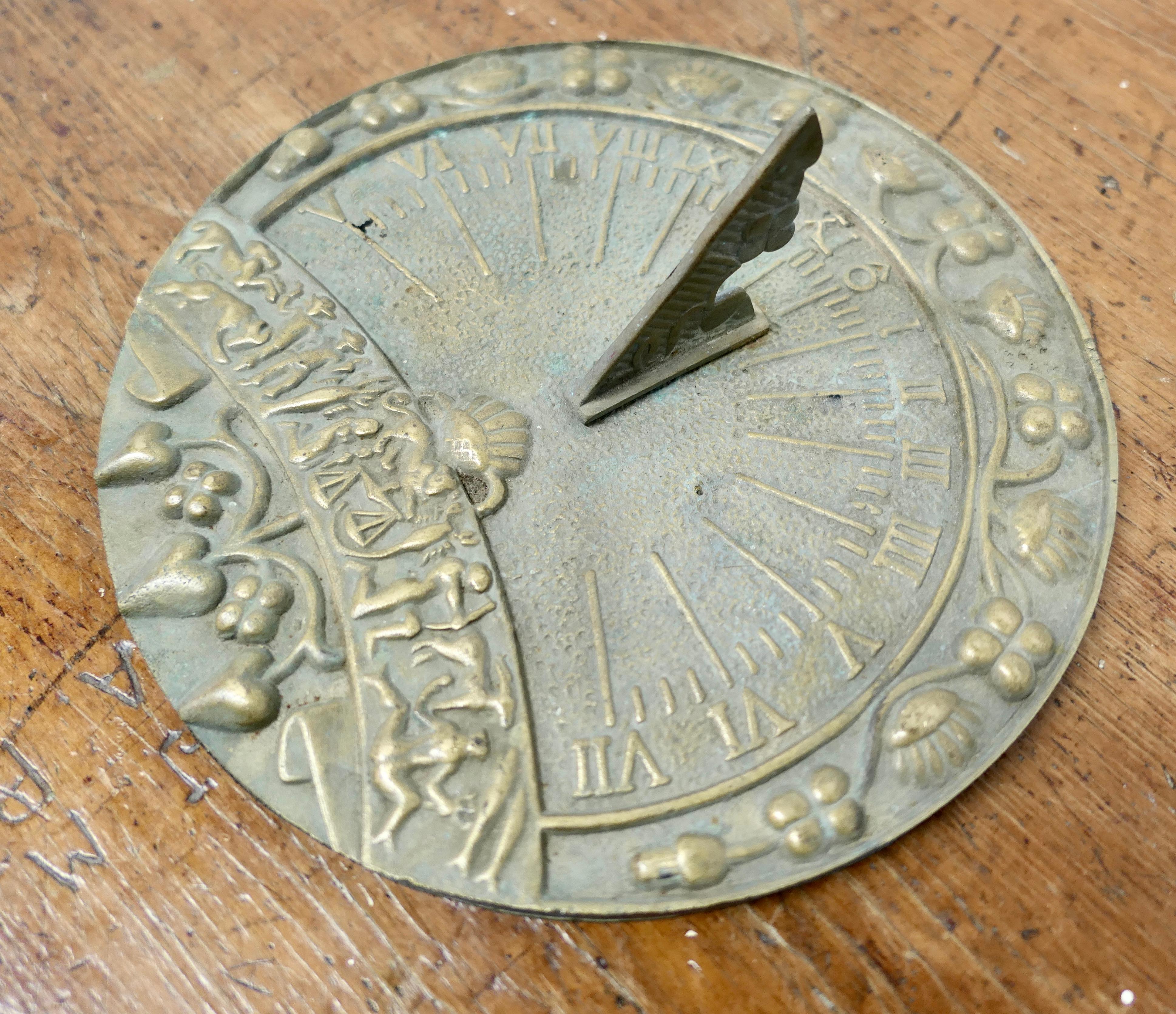 Weathered Brass Garden Sundial

This sundial is made in Cast Brass, it is a heavy piece, the numerals are Roman and there are also the astrological signs around the bottom
A very attractive piece with its own unique character
The Sundial is 3” tall