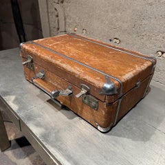 Weathered Brown Vintage Suitcase With Metallic Latches Industrial