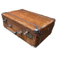 Weathered Brown Vintage Suitcase With Metallic Latches Industrial