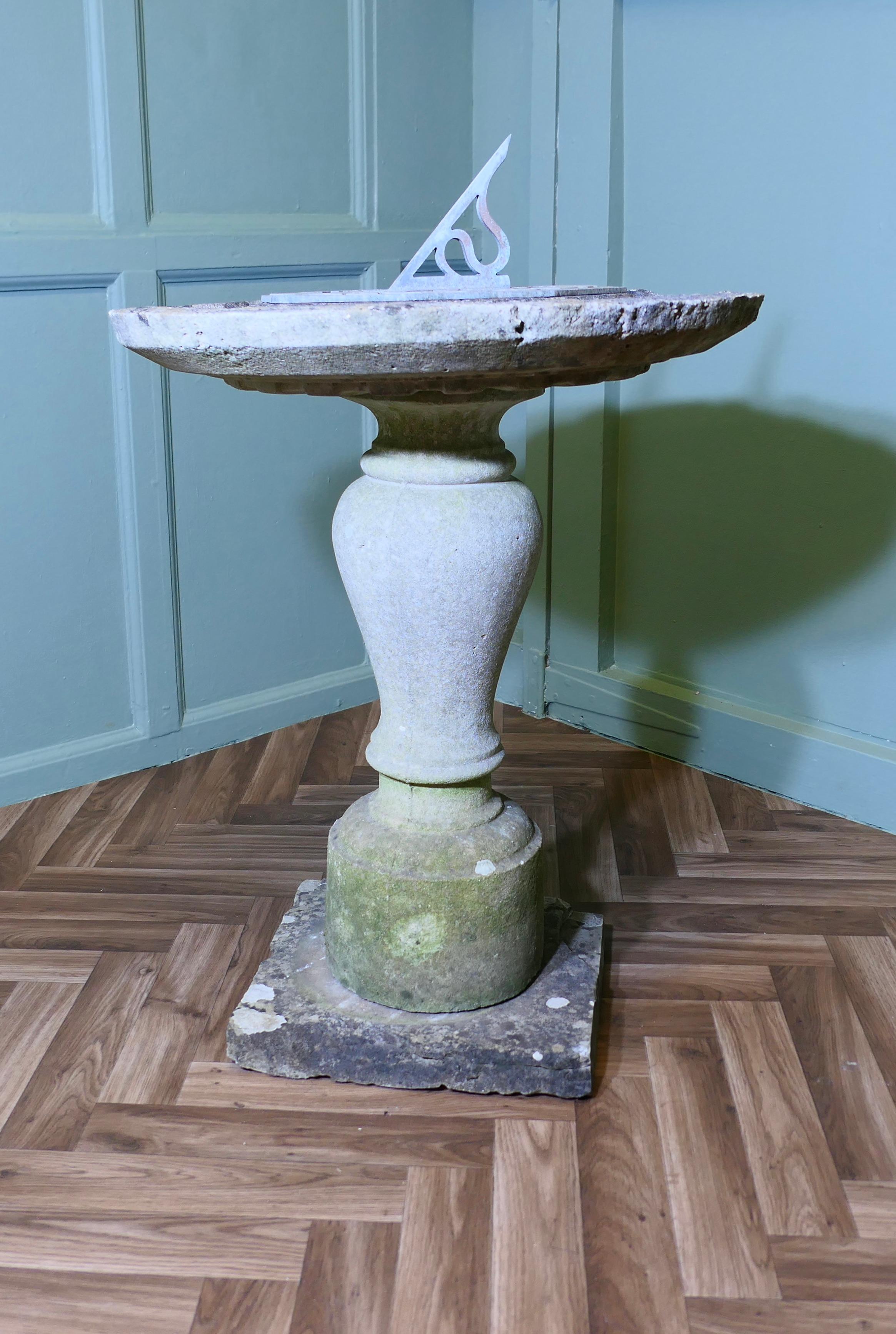 Weathered Carved Stone Bird Bath, Sun Dial

A lovely old weathered stone bird bath with a sundial at the centre, there is a plaque on the sundial in French which translates as time passes friendship remains 1805.
The bird bath is in well weathered