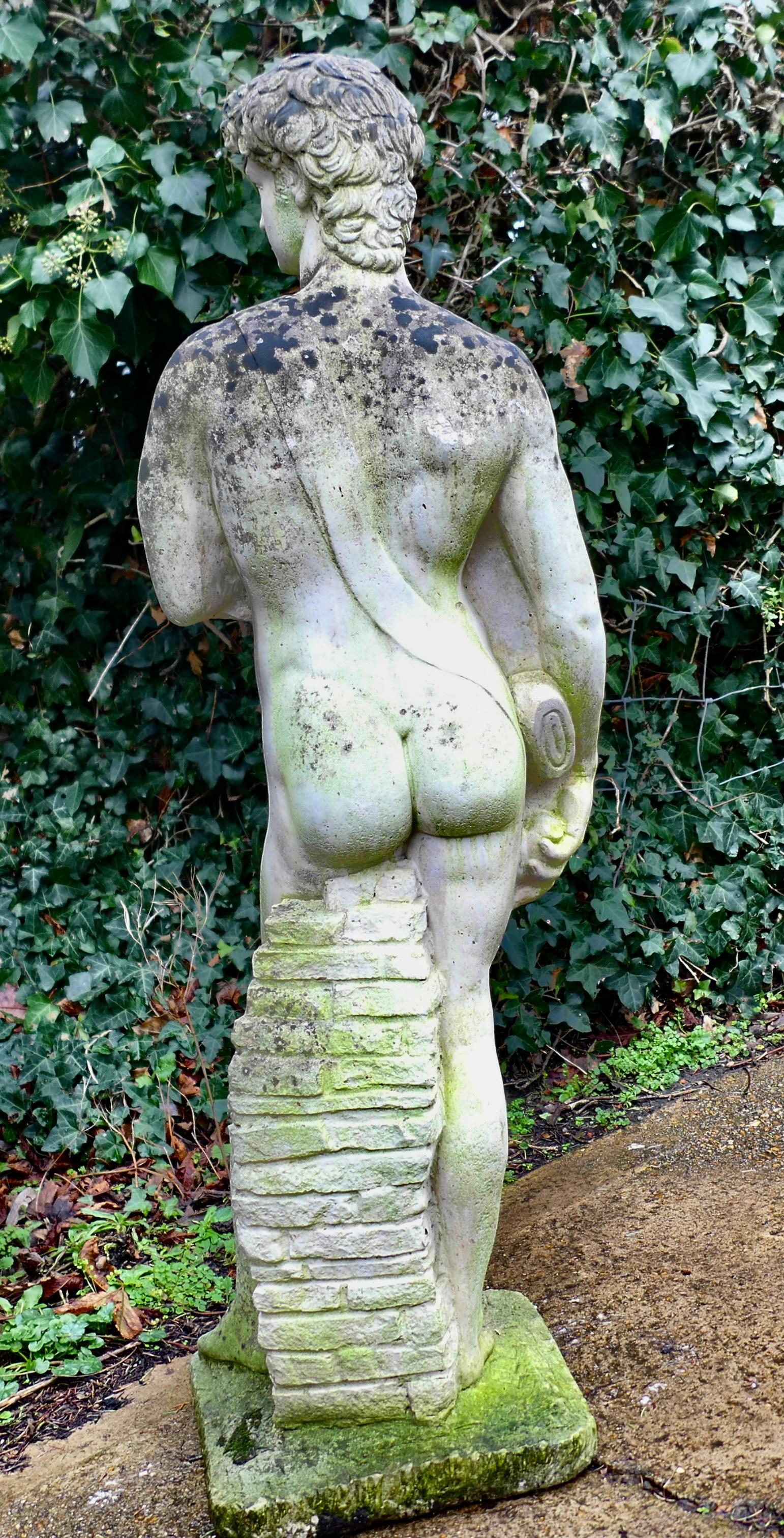 Mid-20th Century Weathered Cast Statue of Michelangelo's David A lovely piece for the garden For Sale