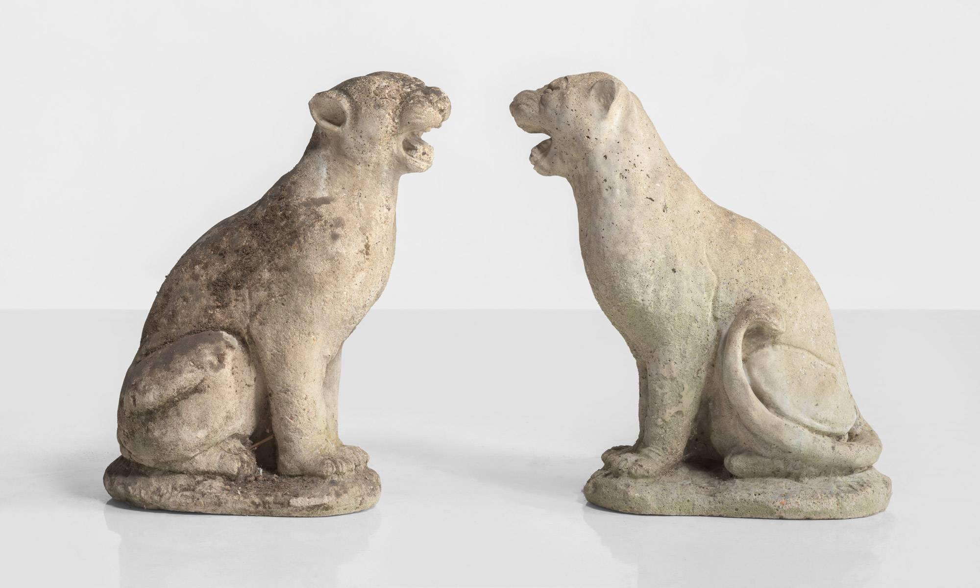 Weathered Cougars, circa 1970.

A pair of cast stone garden statues with unique patina.