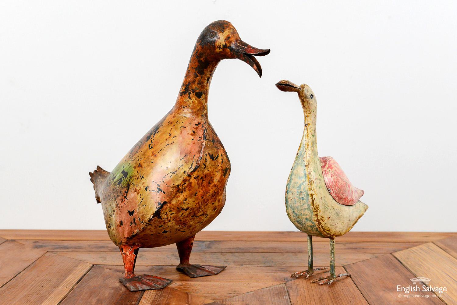 Charming painted metal birds with weathered peeling paint. The smaller one [a seagull or duck, we're not sure!] measures: 20cm wide x 30cm high x 7cm deep. The larger one measures: 38cm wide x 38 cm high x 19cm deep.