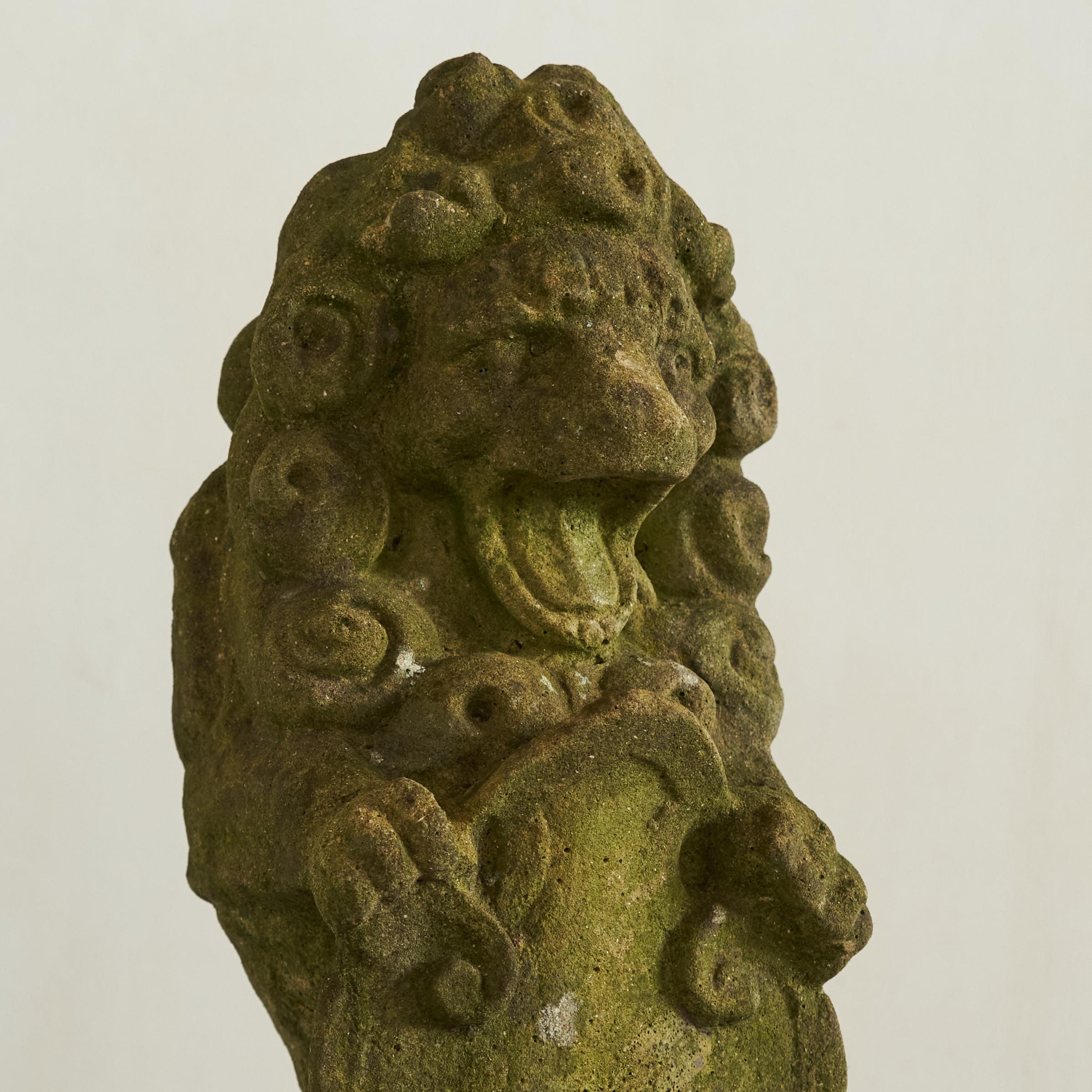 Art Deco Weathered, Mossy and Patinated Cast Stone Lion with Shield Garden Statue 1930s For Sale