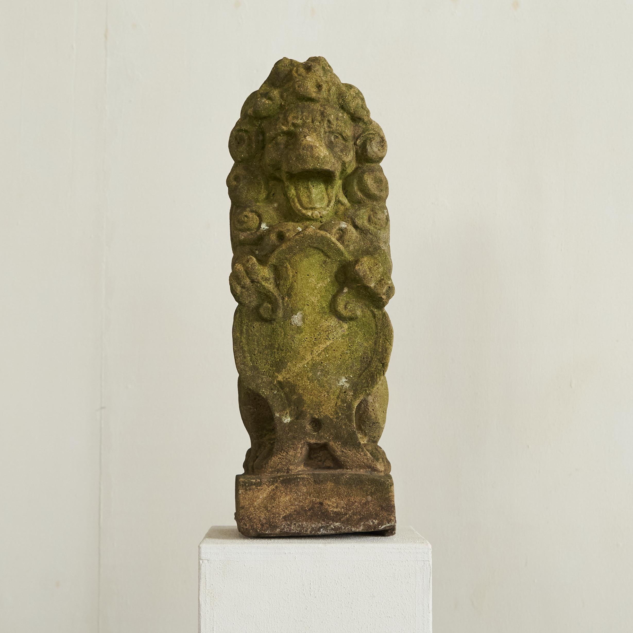 European Weathered, Mossy and Patinated Cast Stone Lion with Shield Garden Statue 1930s For Sale