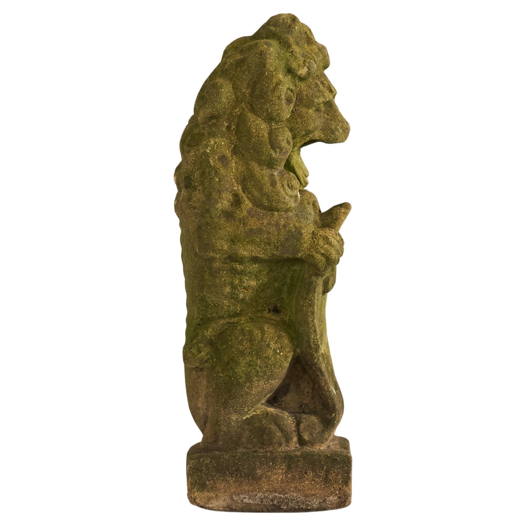 Weathered, Mossy and Patinated Cast Stone Lion with Shield Garden Statue 1930s For Sale