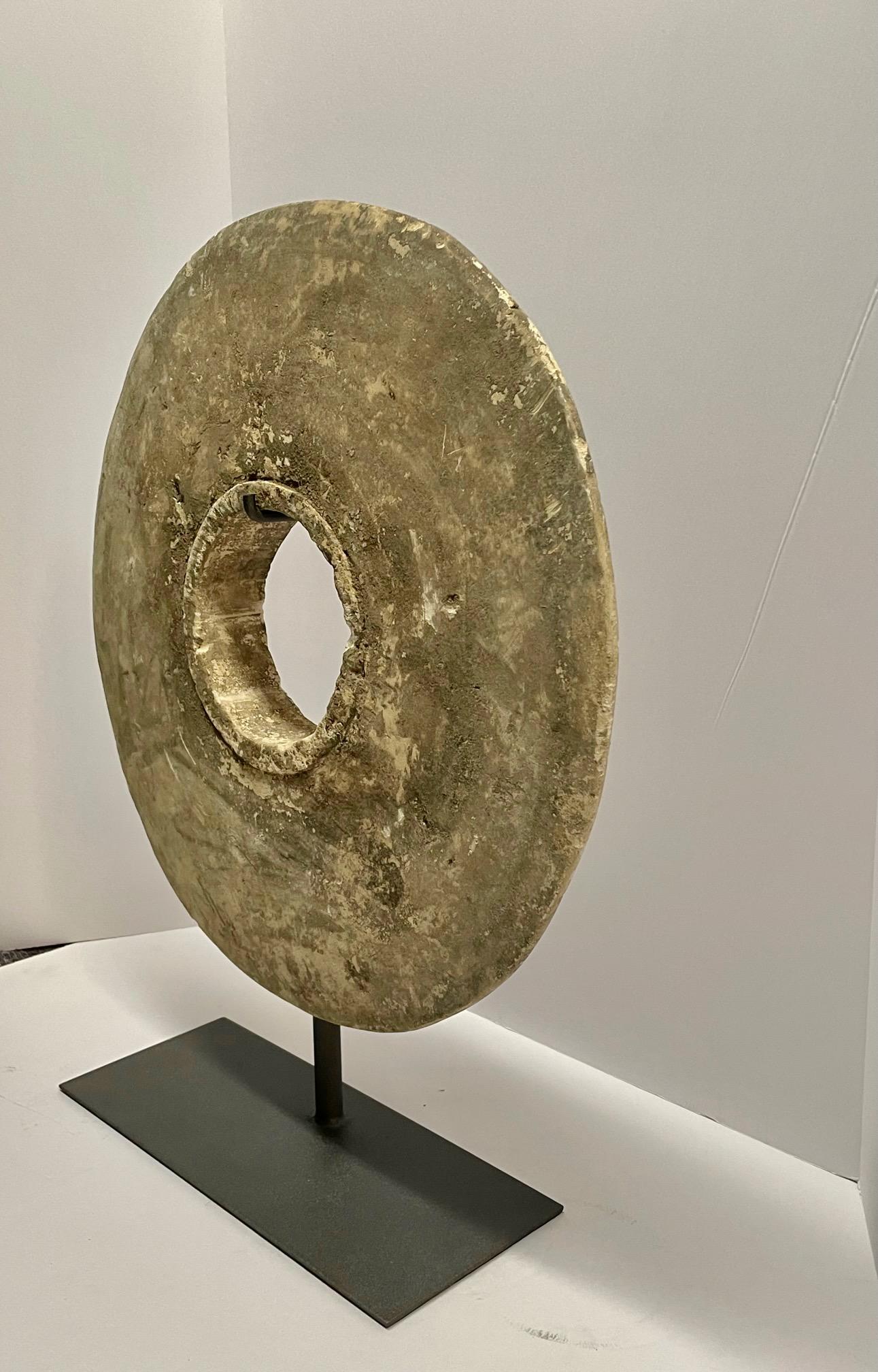 Indonesian Weathered Stone Architectural Disc Sculpture, Indonesia, 1920s For Sale