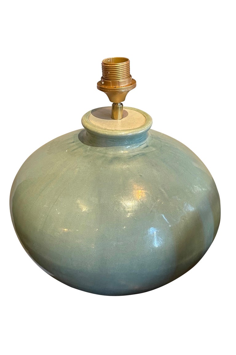 Contemporary Chinese pair of weathered turquoise lamps.
Full rounded shape base
Base measures 14D x 11H.