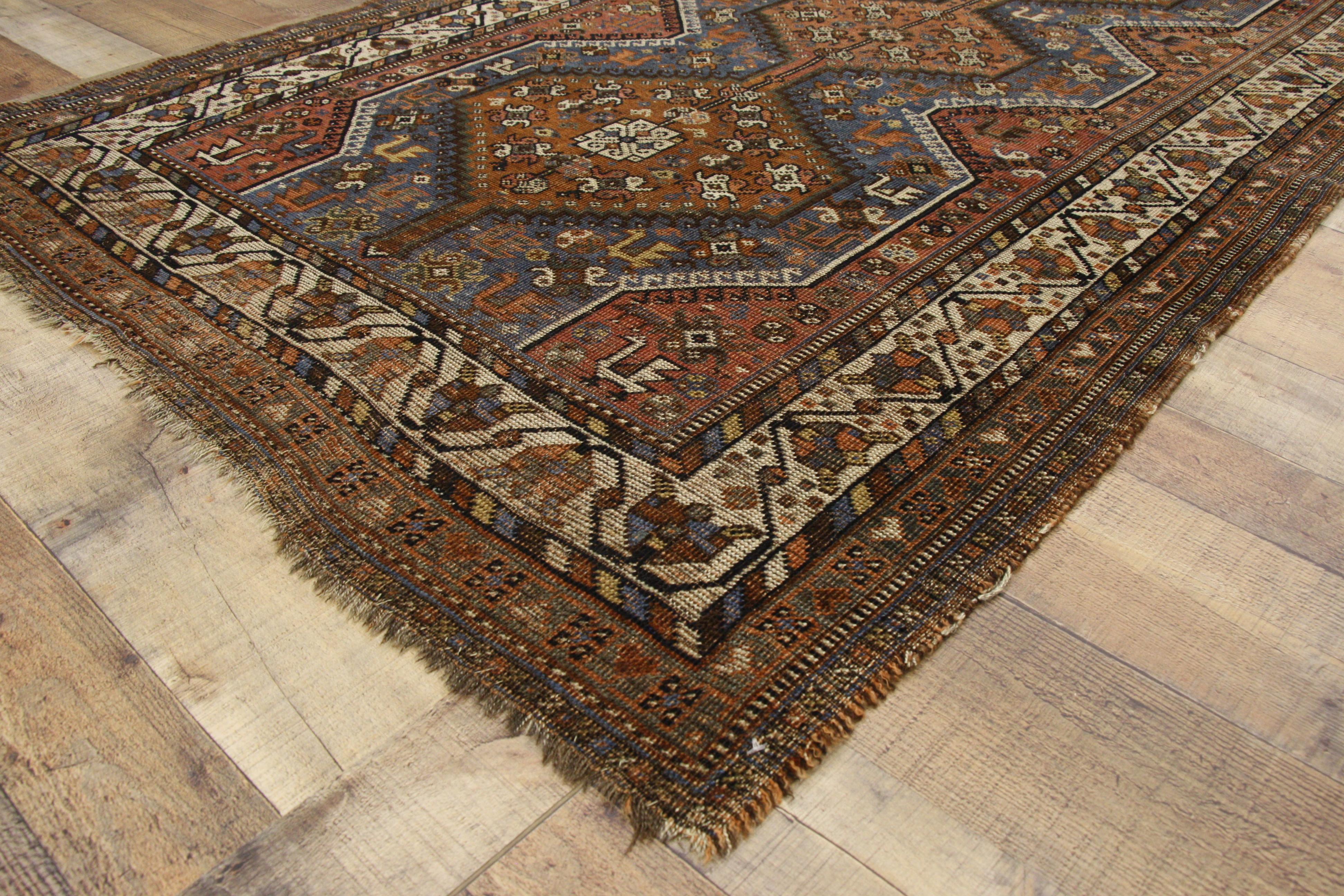 20th Century Distressed Vintage Persian Shiraz Tribal Rug For Sale