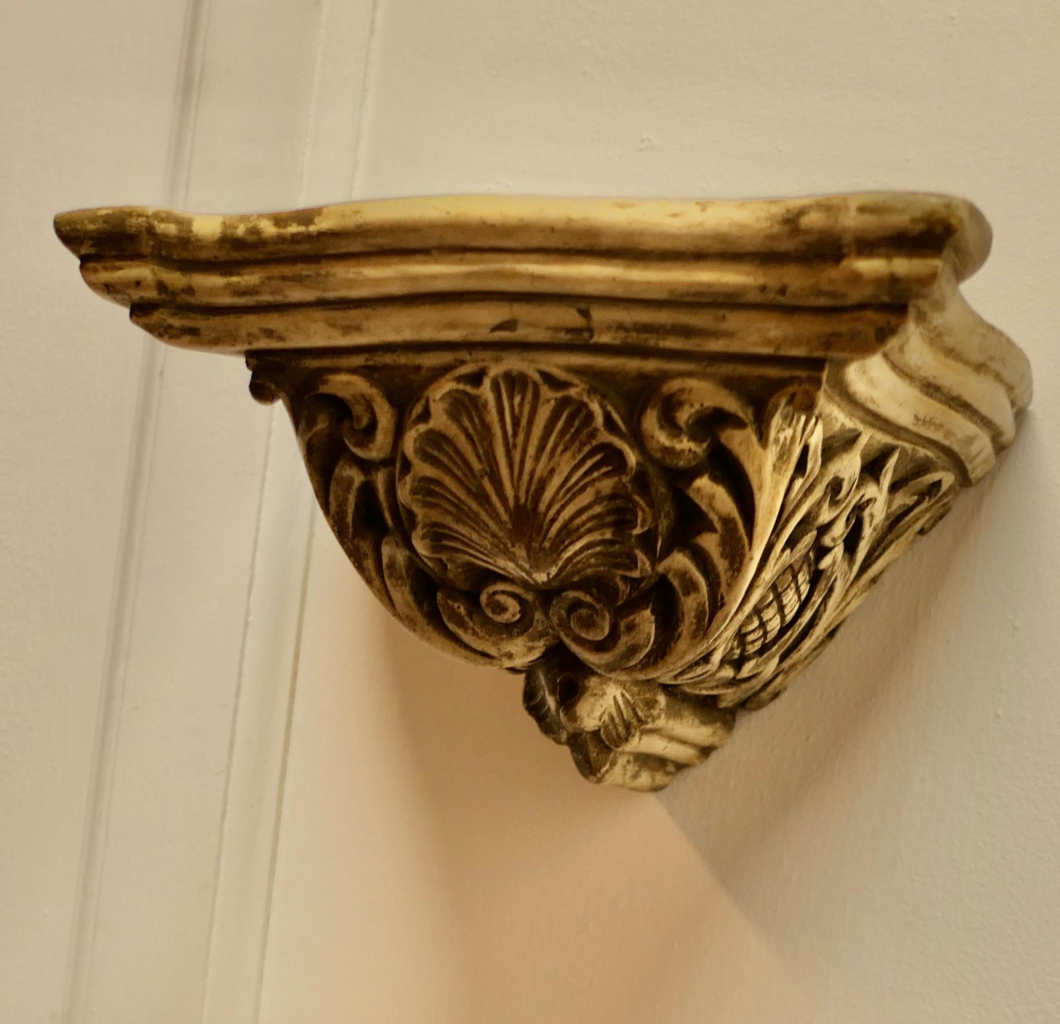 19th Century Weathered Wall Bracket, carved with Shell Decoration  This is a well weathered p For Sale