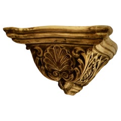 Antique Weathered Wall Bracket, carved with Shell Decoration  This is a well weathered p