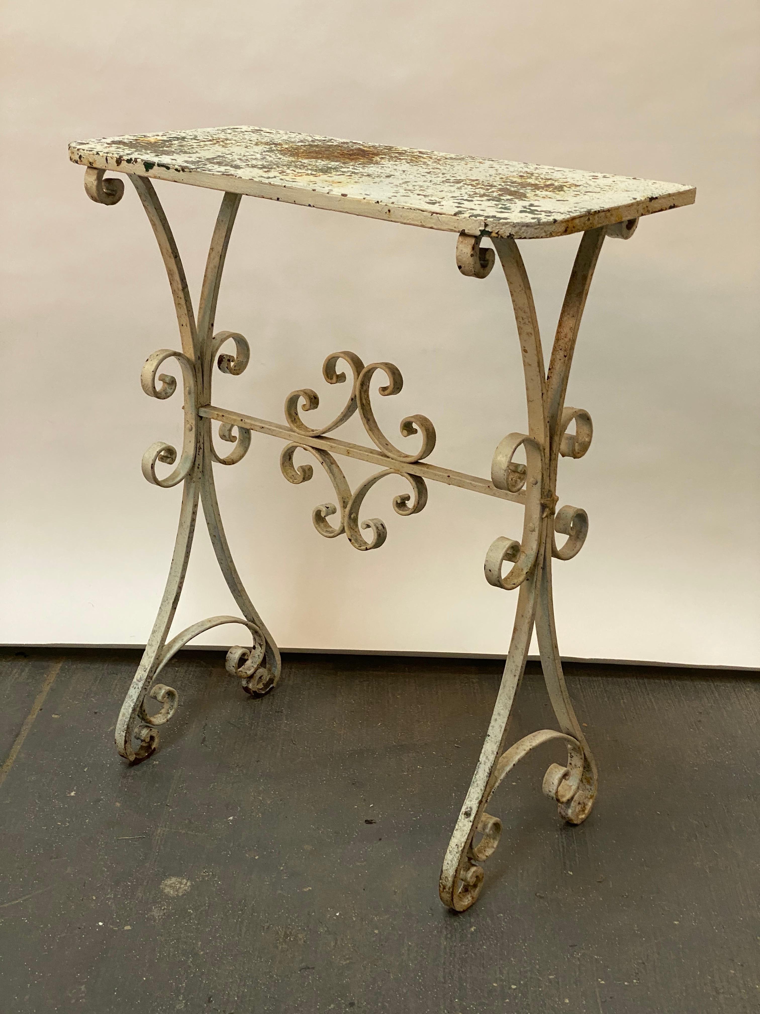 Weathered Wrought Iron Scroll and Star Motif Console Table In Distressed Condition For Sale In Garnerville, NY